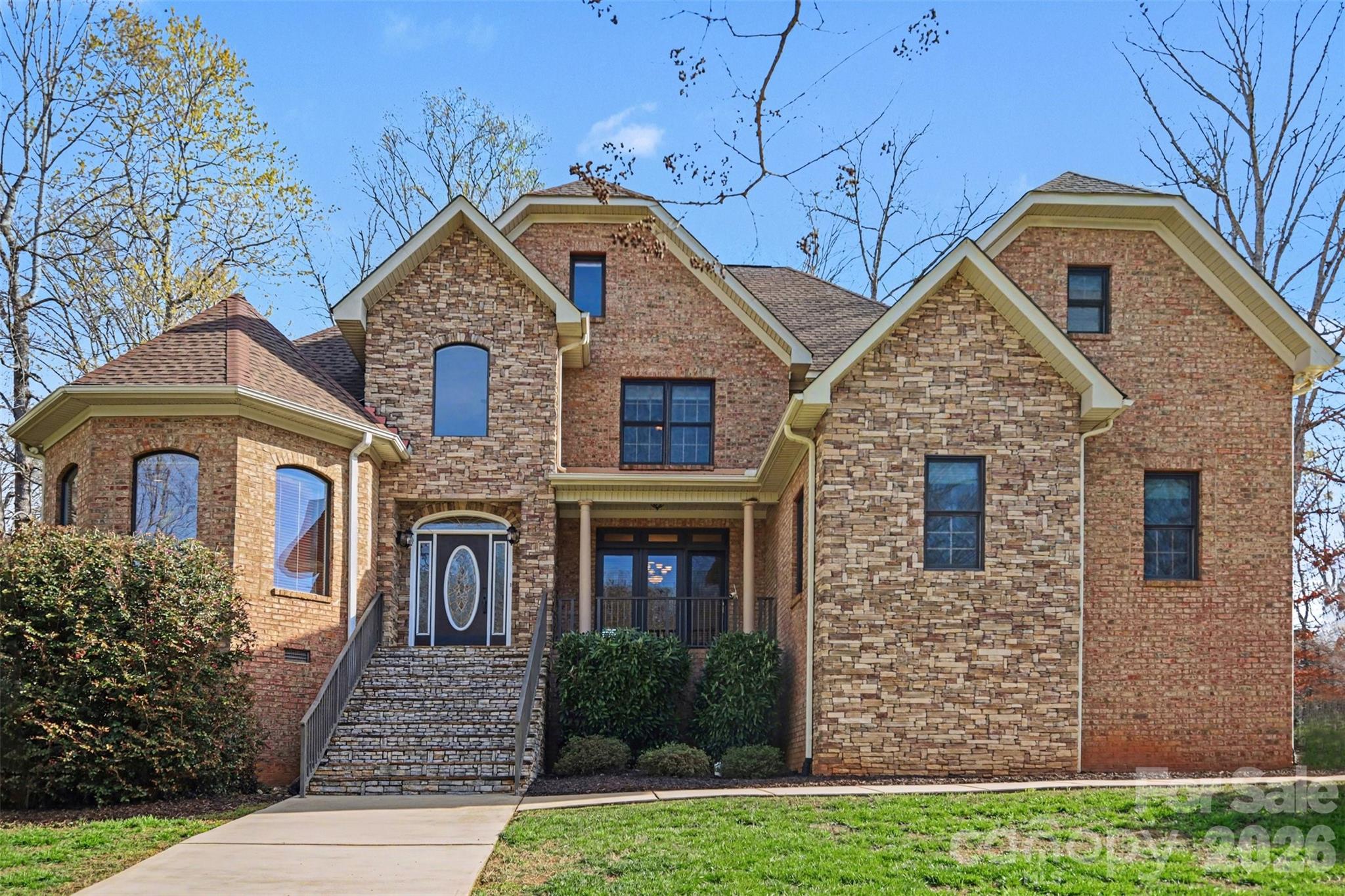 Exquisite Luxury in Country Club Hills experience elegance and superior craftsmanship in this custom-built, full-brick and stone accent residence located in the highly desirable Country Club Hills subdivision. From the grand two-story open foyer with marble flooring to the soaring vaulted ceilings, every detail of this home exudes quality with a gourmet chef's kitchen equipped with a five-burner gas cook-top, double oven, and high-end stainless steel appliances. Features solid wood cabinetry, a center island, and a spacious pantry. The great room is an inviting space centered around a classic fireplace, perfect for entertaining. Family room is a cozy retreat featuring a second fireplace flanked by beautiful custom built-in shelving. The primary retreat is a sprawling bedroom featuring a dedicated sitting area and a spa-like luxury en suite which includes a brand-new glass accent wall and a relaxing Jacuzzi tub. *Tankless Water Heater* Generously sized secondary bedrooms, including a convenient Jack & Jill bathroom layout. also, new paint. The indoor-outdoor flow is seamless with elegant french doors lead from the dining room to a large screened porch, offering a seamless transition for al fresco dining and morning coffee.
*Central vacuum, Jacuzzi tub, 2 Fire place are sold as current condition. No known problem.*