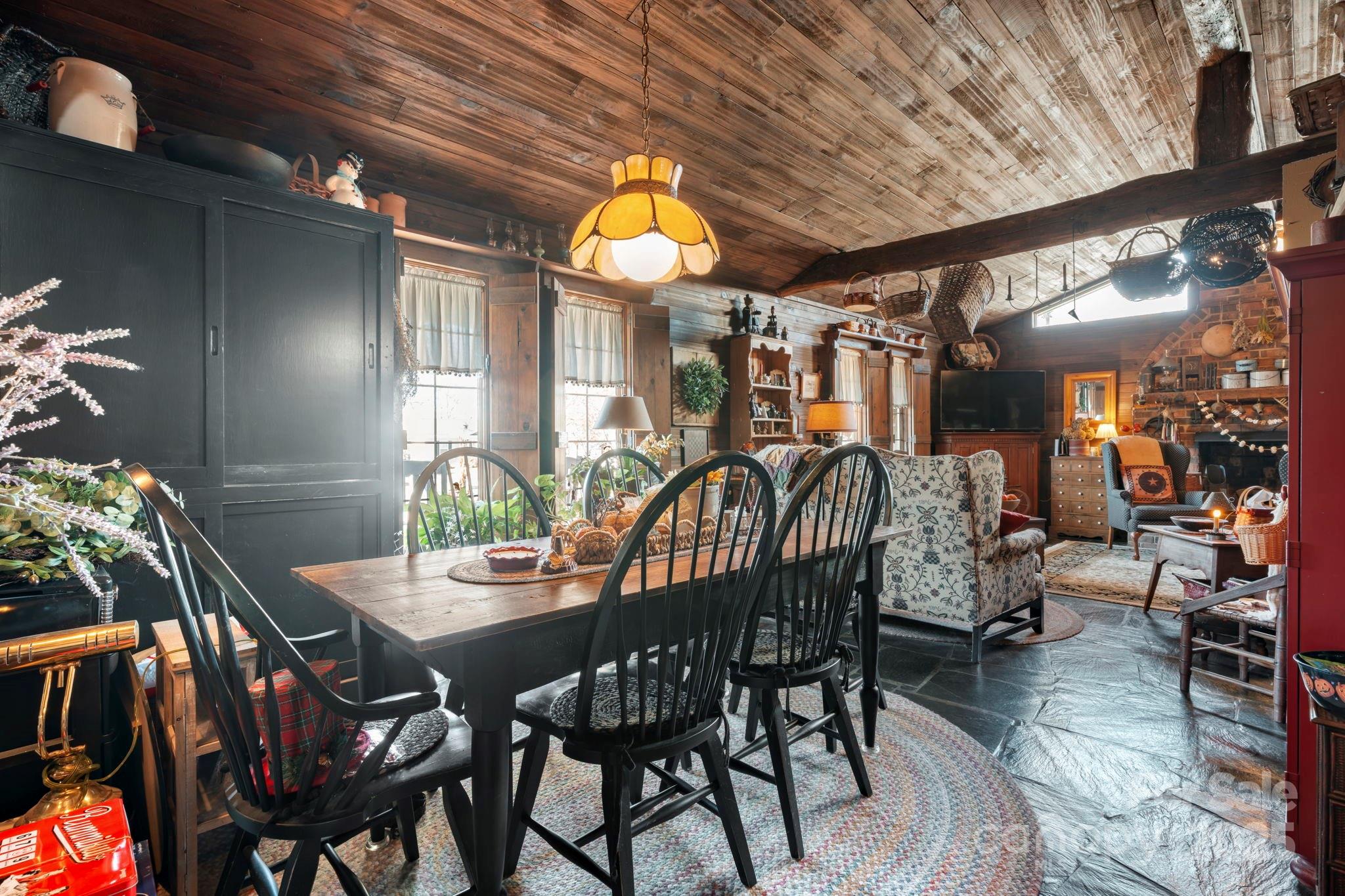 Welcome to this beautiful storybook Arts & Crafts style home, perfectly situated on a charming corner in a town that is growing, thriving, and full of opportunity. This 3-bedroom, 2-bath home is truly one-of-a-kind, offering unique architectural touches and a warm, inviting feel the moment you step inside.
Thoughtful details and handcrafted style flow throughout, creating a cozy atmosphere ideal for everyday living. The home features a flexible space that can serve as den/ living area combo or room to entertain whatever you need it to be.

Outside, you’ll find multiple patio areas designed for privacy, relaxation, and effortless entertaining. Whether you’re hosting friends or enjoying a quiet morning coffee, the outdoor spaces make this home feel like your own private escape.

Just one block from Main Street, you’ll love the convenience of walking to parks, schools, dining, shopping, and local entertainment. With booming job opportunities and a vibrant uptown area nearby, this location offers both comfort and growth.This home is truly unique in style, rich in charm, and nestled in one of the most desirable pockets of town, don’t miss your chance to make it yours.