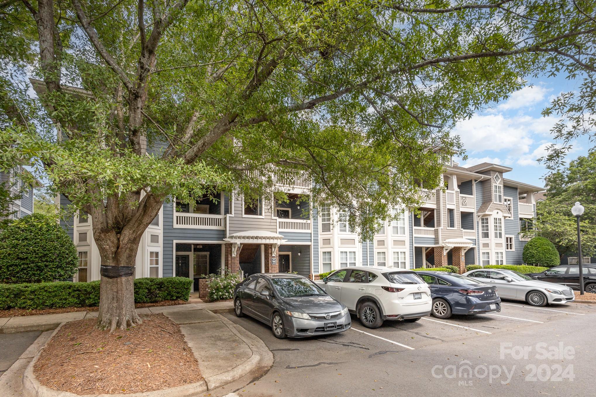 Welcome to Olmsted Park! This quiet top floor, TWO story unit is in the center of it all. This home features a spacious and bright living room with cathedral ceilings, a relaxing screened in back porch, front deck, fresh paint, new flooring throughout and much more! Each floor has its own large bedroom and bathroom, perfect for a seperate office, guest room, or a roommate. The second floor primary bedroom features a cozy reading nook and skylight. This is one of the largest units in Olmsted Park. Enjoy the community pool, clubhouse, and all Southend has to offer just blocks away!