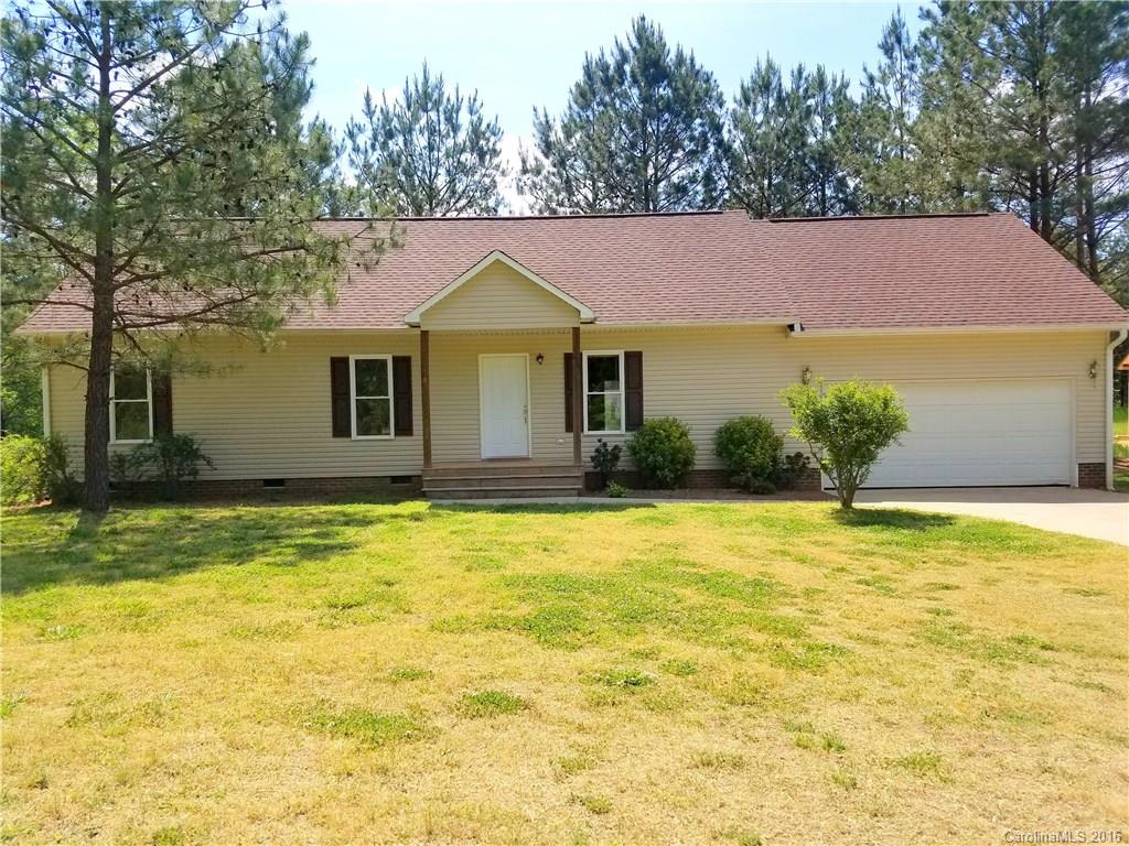 Well maintained 4BR/2BA home nestled in the country. Home features open living room to kitchen, laminate flooring, large back deck and attached 2 car garage. Enjoy your evening outside as you build a bonfire or explore the woods behind. Don't miss out on this one!!!!