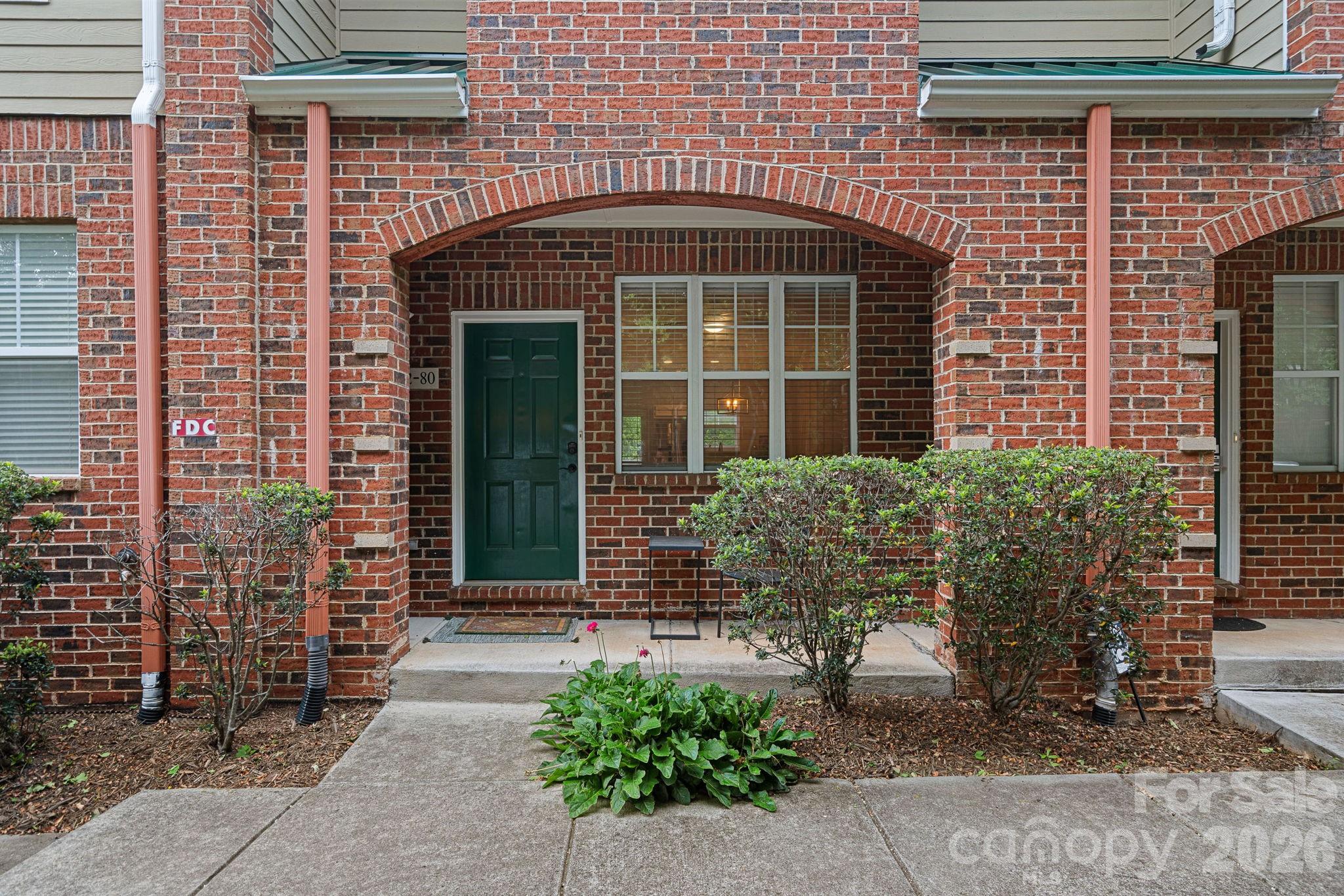 Move-in ready and perfectly positioned just minutes from Uptown Charlotte, this charming 2-bedroom, 2.5-bath condo offers the ideal blend of comfort, convenience, and low-maintenance living. Tucked away on a quiet residential street, you’ll love having an attached one-car garage, additional street parking, and a welcoming layout designed for everyday living.
The bright kitchen features timeless white cabinetry, ample storage, and a refrigerator that conveys, making moving in even easier. The adjacent dining area has been thoughtfully updated with elegant picture molding and stylish lighting, creating a space that’s perfect for everything from casual dinners to entertaining friends. A convenient laundry area includes the washer and dryer, and the lower-level basement provides valuable extra storage or flexible space to fit your needs. A security system is also included for added peace of mind.
Whether you’re a young professional, medical professional, or anyone looking to enjoy an active city lifestyle, this location is hard to beat. Walk to Atrium Health and Novant Health facilities, grab coffee at a nearby café, meet friends for dinner, or enjoy the convenience of shopping at Trader Joe’s, Target, and countless restaurants and local favorites just minutes from your door. With easy access to Uptown Charlotte, major highways, parks, and entertainment, you’ll love calling this home.