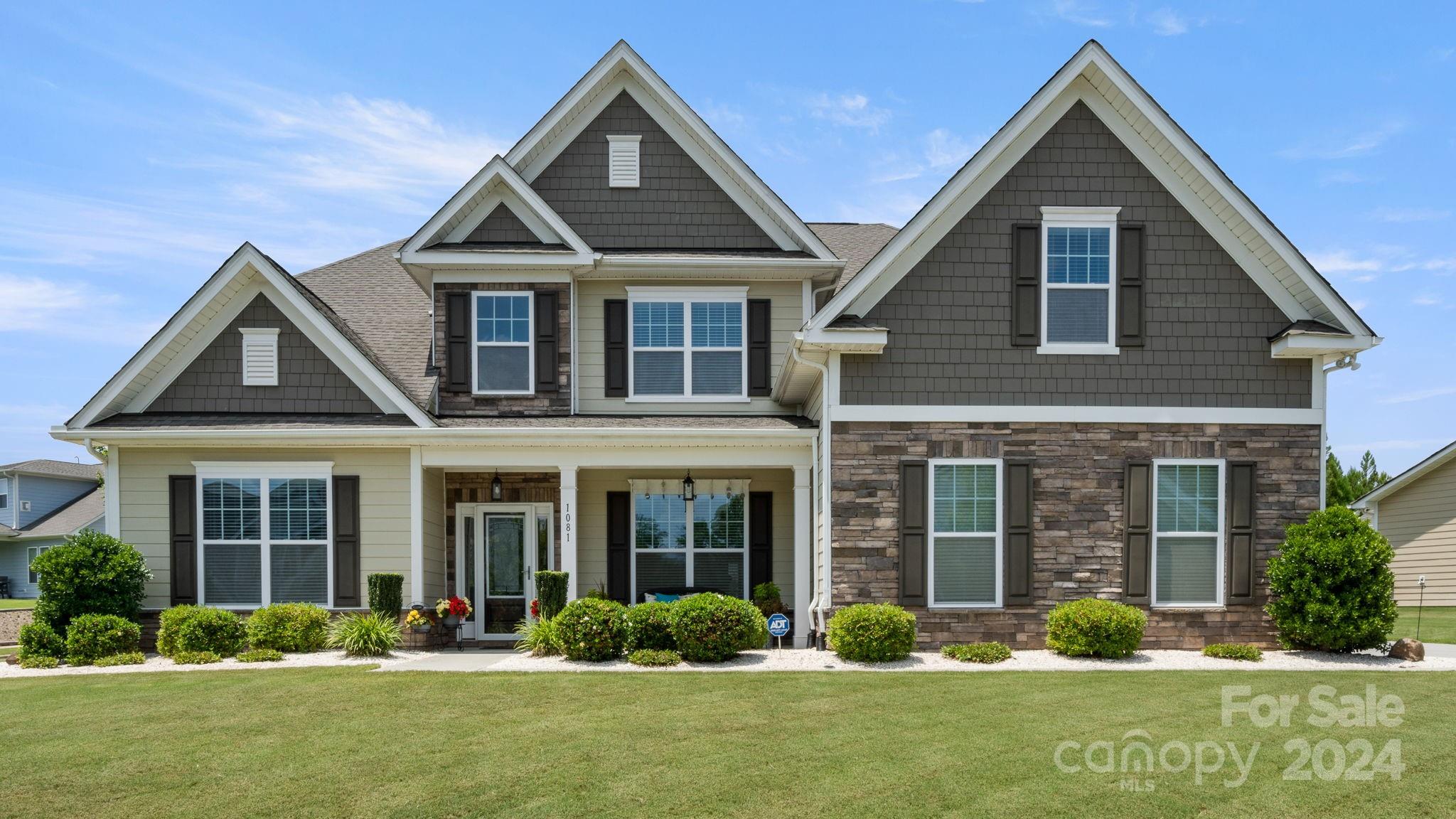 Pristine Essex home in the coveted Massey community in Fort Mill is ready for the discerning buyer. Create an experience in this oversized kitchen with a large island, a peninsula, double ovens (one is convection), gas stove top, butler's pantry, and tons of storage opening up to a breakfast nook and great room with a fireplace and a coffered ceiling. Bring the party out to the large screened-in patio overlooking a fenced-in manicured lawn that is beautifully landscaped and has irrigation. The 3-car epoxied garage will not disappoint with plenty of storage.  This 5 bedroom 3.5 bathroom home has plenty of space for all of your needs including a 1st floor office, dining room, and a 2nd floor family room!  Book your private showing soon.