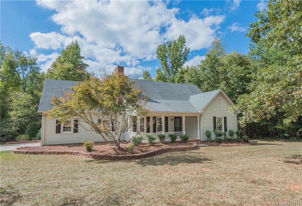 Looking for Land in the Rock Hill/Lake Wylie area? Look no more! Offering 3.44 Acres w/Lg. Det. Shop/Bldg., & Spacious Updated 2-Story Home. Enjoy Master Down, HUGE Eat-in Kitchen, Open Family Room w/FP, So Living Screen Porch & Tons of Storage.  Embrace Updates Galore that include: New HVAC, Siding & Garage Door, Flooring throughout, Paint, C-Tops, Fixtures, Toilets, & Appliances. Upstairs has Huge Rec Room & 2 Sleeping Quarters, One that doubles as Bonus/4th Bed. Great Schools!
