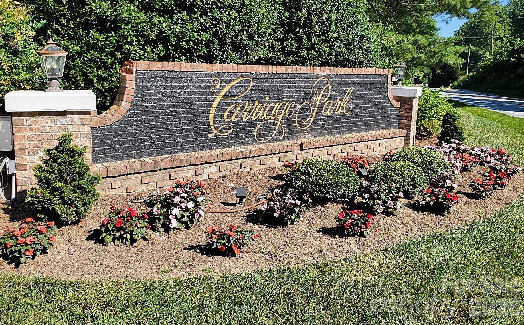 Dramatic Price Reduction don't miss out! Welcome to Carriage Park! Here's Your Chance To Build Your Dream Home In A Highly Desirable Gated Community. Enjoy all the amenities that Carriage Park has to offer. A Beautiful gated Entry with Pond, Clubhouse with an Indoor Pool, Tennis Courts, and Walking Trails & Social Activities. All located within minutes to downtown Hendersonville. Set of Existing House Plans Available with Purchase. Total of 7.4 Acres of common area surrounds the rear of lot and Wood Owl court. Priced well below tax value.