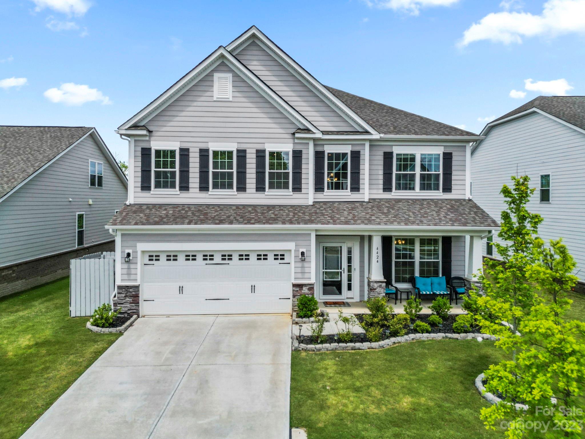 Step into this exquisite 5-bedroom, 2-level home, designed with a harmonious blend of style and functionality. Its unique attributes, such as dual primary suites on each floor and an open floor plan, make it a top-tier choice for those in pursuit of both comfort and refinement.  As you cross the threshold, you'll be welcomed by an airy open floor plan that seamlessly integrates the family room, chef's kitchen, and the breakfast room. On the main level, one of the two luxurious primary suites resides, featuring a bath suite and ample closet space. Ascending up one level, the second primary suite promises an equal level of luxury, complete with its own bath suite & expansive closet. Three more bedrooms provide space for family or guests, complemented by a full bath. An extensive loft area offers a second entertainment space or a cozy retreat. Rounding out this home's many functional features is a spacious two-car garage, a flex room for formal dining or office space.