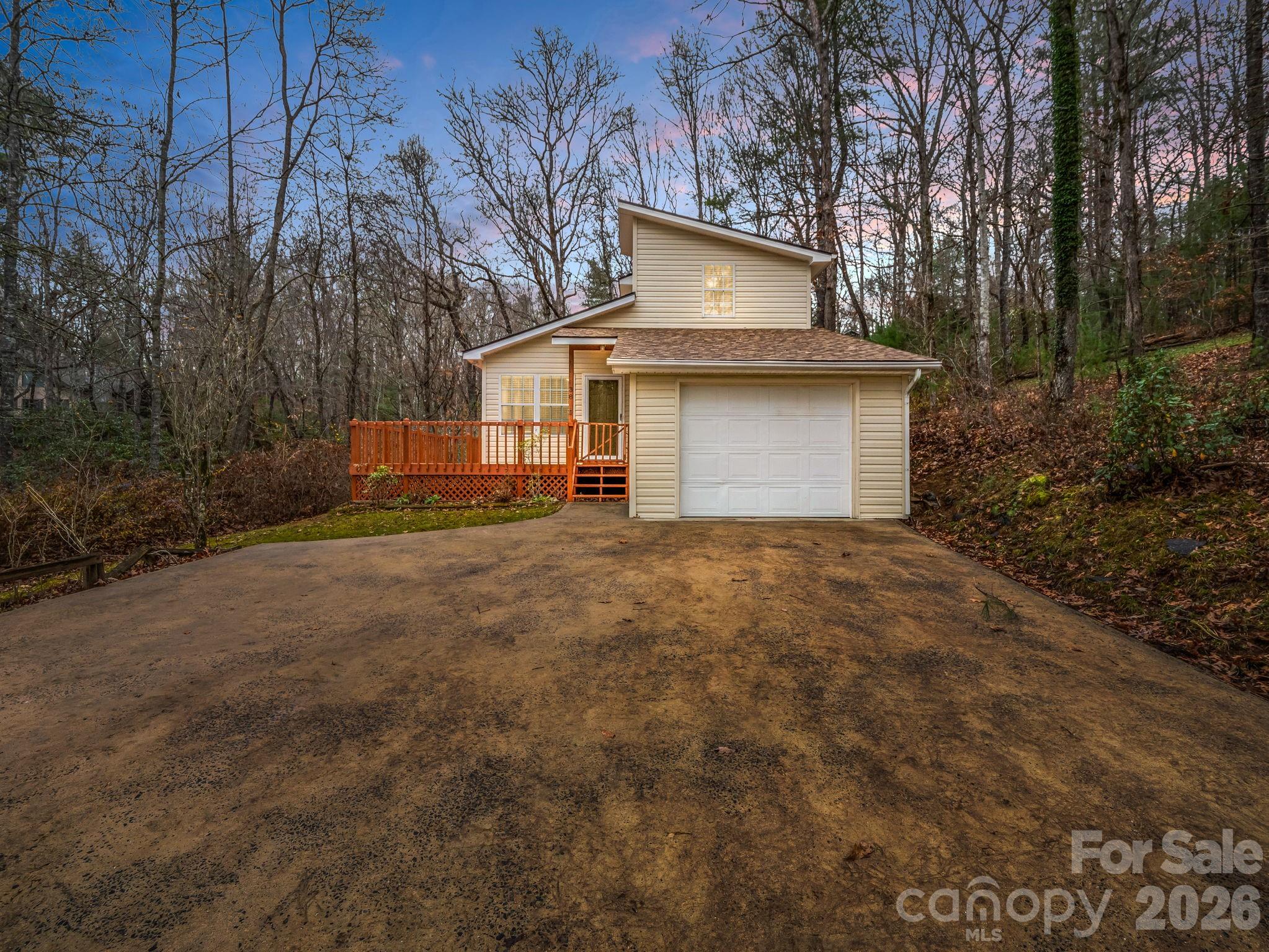 Discover mountain living at its finest in the charming 2-bedroom, 2-bath home, perfectly tucked into a serene, wooded setting just minutes from town.  Full of natural light and surrounded by the beauty of the mountains, this inviting property offers peace, privacy, and convenience- an ideal retreat for year-round living or a weekend getaway.  Located just a short drive from the East Fork River, a renowned Class A trout stream, this property places world-class fly fishing practically at your doorstep.  Whether you're spending the day on the river or exploring nearby trails, the best of mountain recreation is within reach.  If you're seeking a peaceful setting with quick access to town, nature, and adventure, this property delivers the perfect balance of tranquility and practicality.