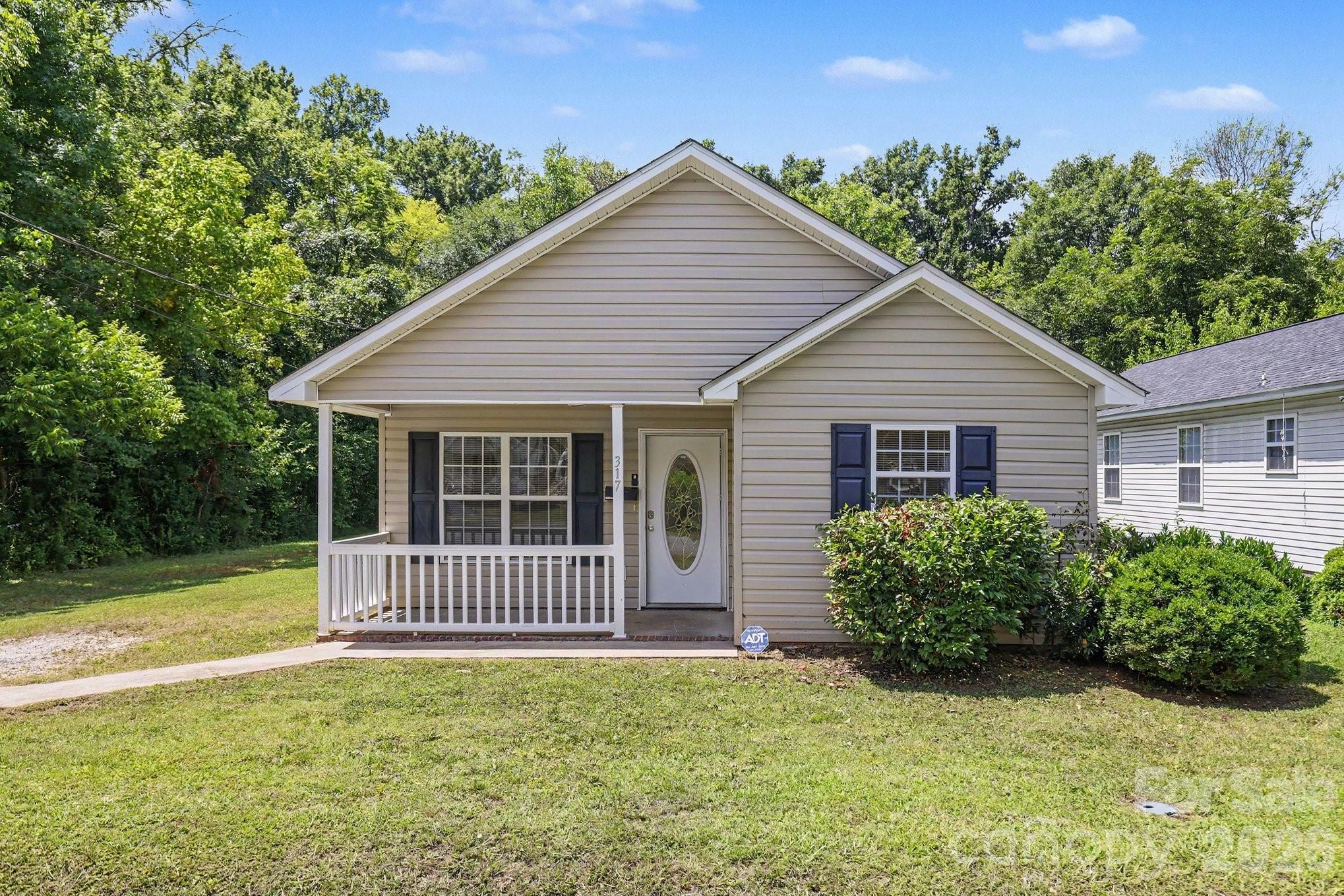 This beautifully updated 3 bedroom, 2 bathroom home is one you won't want to miss!  Move-in ready and packed with updates plus NO HOA! Major 2026 improvements include new flooring, fresh interior paint, new toilets and new light fixtures giving the home a fresh feel from the moment you walk in. Major 2024 improvements include a completely new roof, siding on a portion of the home, five windows, side door and deck railings. This property offers the perfect combination of modern upgrades, affordability, and everyday convenience with a great location. Outside you'll enjoy the private, tree-lined backyard, providing a peaceful setting for relaxing, entertaining, or gardening. Whether you're enjoying your morning coffee or hosting a weekend cookout, this outdoor space offers both privacy and potential.  Previously rented for $1295, with consistent tenant occupancy.  Conveniently located just minutes from shopping, dining, schools, and all that Rock Hill has to offer, it's an excellent opportunity whether you're looking to make it your own or add to your investment portfolio.