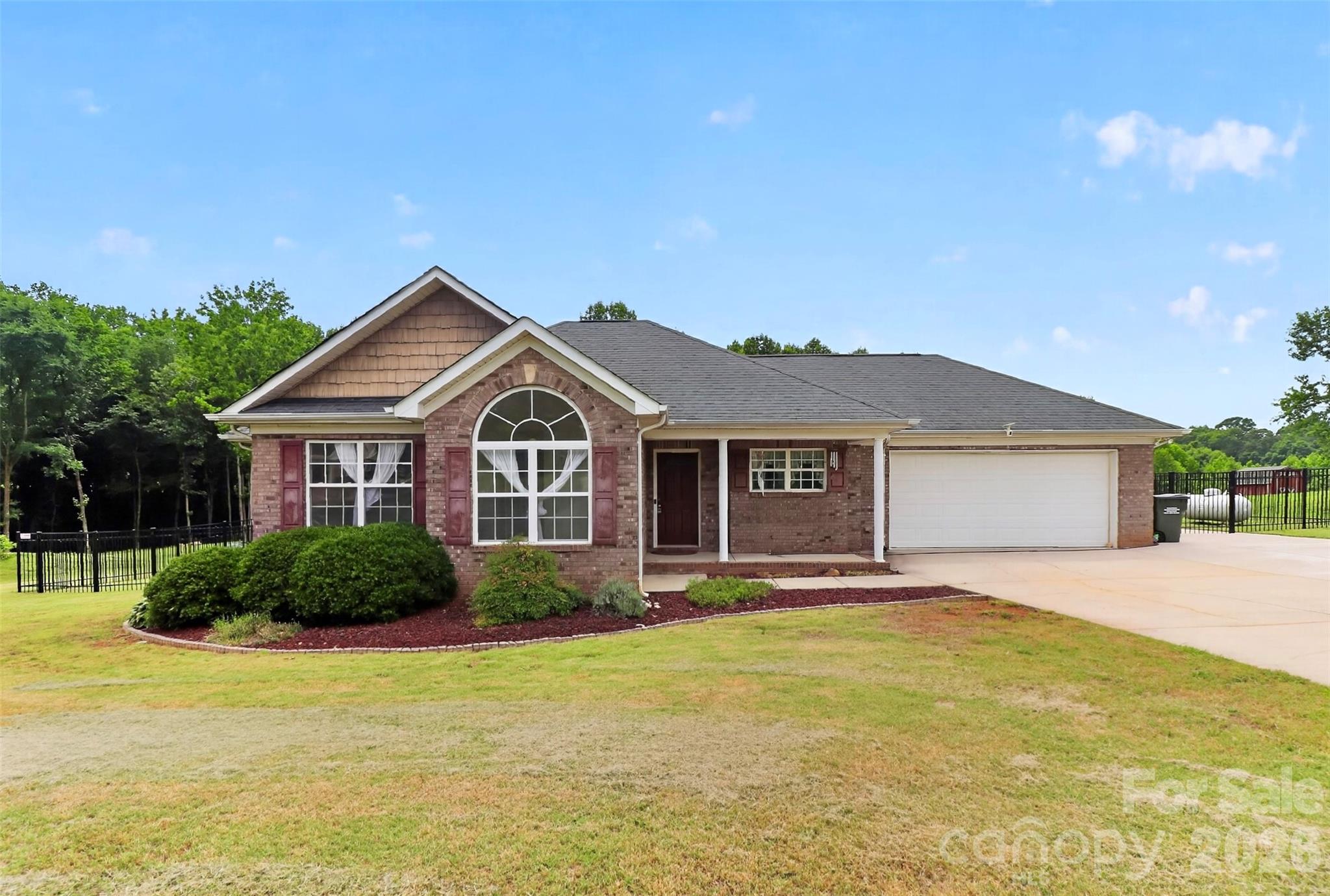 Don't' miss this 3 bedroom/ 2 Bathroom ranch home with a beautiful backyard saltwater pool.  Move in now and enjoy the pool for the summer.  .95 acres on quiet street just a short drive to Downtown Marshville.
New LVP in entry, hallway, bathroom, kitchen dining area and living room.  Open floor plan and attached 2 car garage with plenty of parking in the driveway for your guests to visit and enjoy the pool.