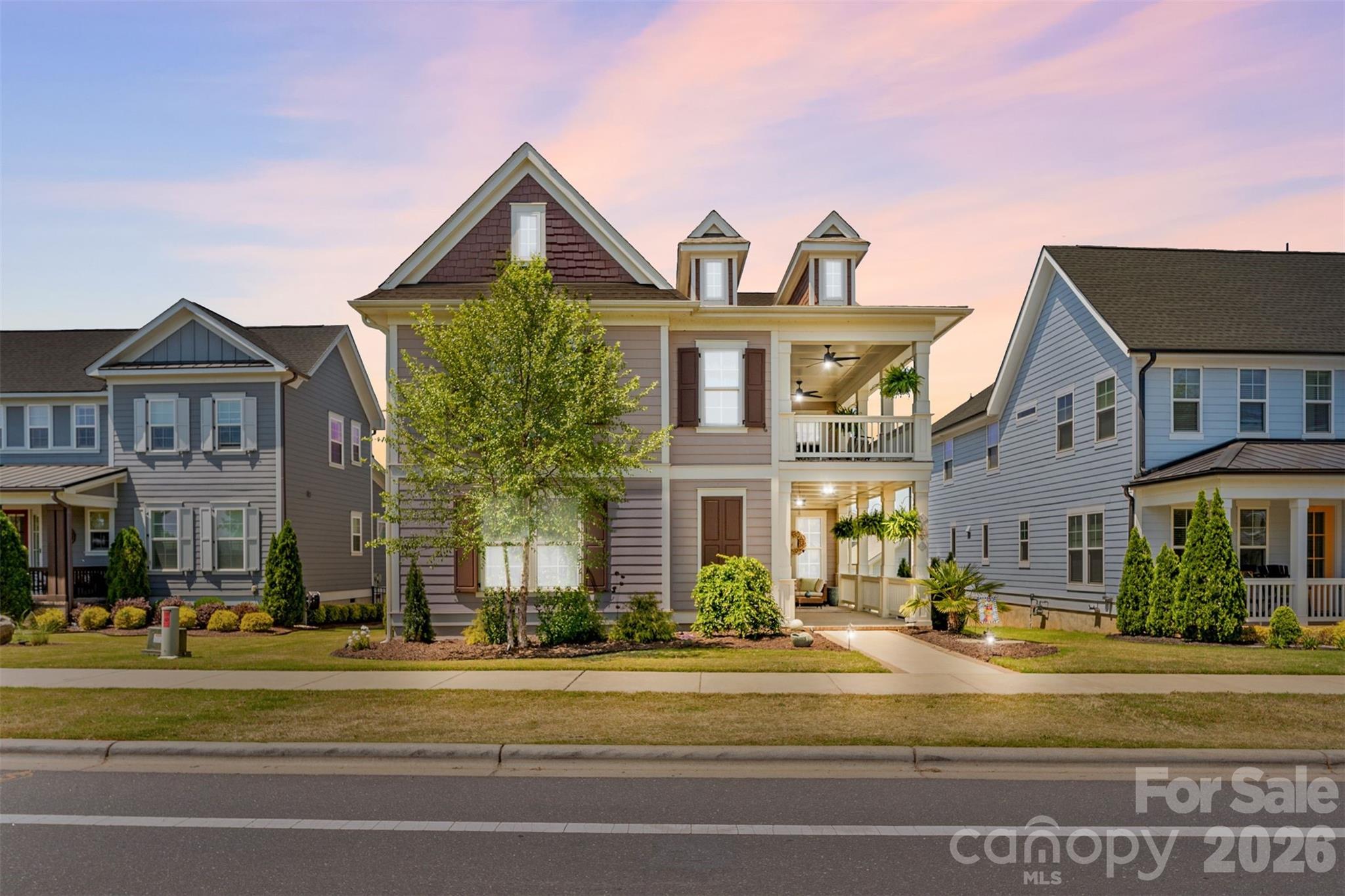 This isn’t just a home—it’s a lifestyle. Nestled along the Catawba River, this vibrant community offers miles of scenic trails, a resort-style pool, activities for all ages, and a mix of casual and upscale dining.
Still need convincing? Step inside and you’ll immediately see what sets this home apart. This stunning Southern home showcases thoughtful design at every turn, featuring both a main-level primary suite and an additional primary upstairs—perfect for flexibility and comfort. Outside, enjoy one of the largest yards in the neighborhood or unwind on one of three inviting porches, ideal for soaking in those warm summer breezes.
All of this, conveniently located just off I-77 with easy access to Charlotte, Fort Mill, and Rock Hill.