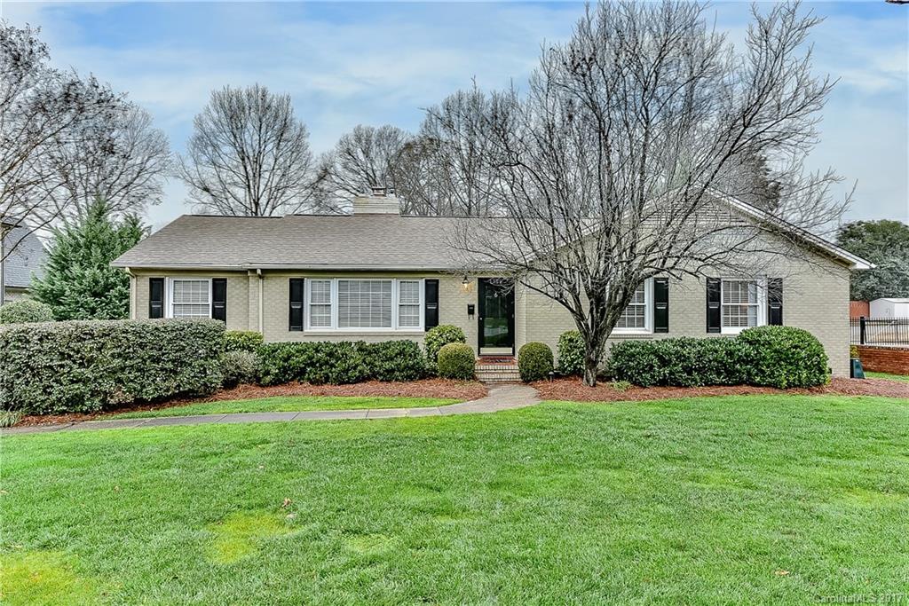 Adorable Olde Cotswold painted brick ranch is renovated top to bottom and move in ready; however it is also situated on a large .4 acre flat lot and has endless possibilities for expansion in this desirable neighborhood. Kitchen has granite countertops, stainless appliances and white cabinetry. Opens to family room and a great sunroom. Beautifully renovated bathrooms. Deck overlooks fenced backyard. Eastover, AG, Myers Park. Walking distance to Cotswold Shopping Center!