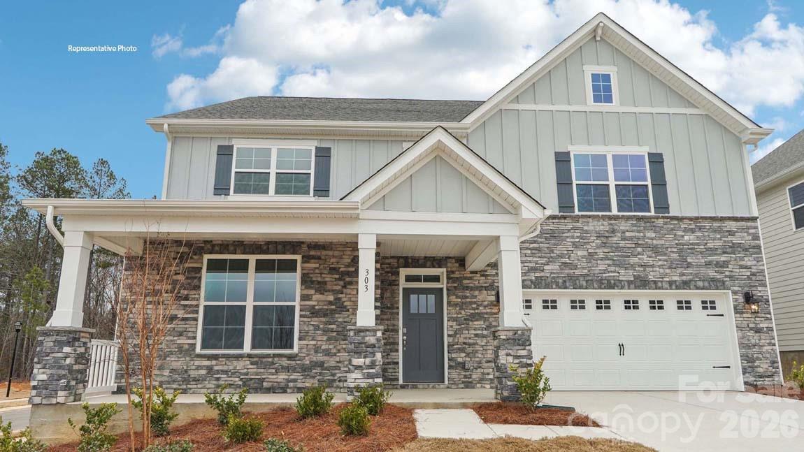 Come tour 7050 Wishing Well Way at Westport in York, SC near Lake Wylie.

This home features an open floor plan creating a spacious and inviting atmosphere. This modern two-story home offers five bedrooms, including one on main level, a flex space, loft, as well as four bathrooms and a two-car garage.

As you step onto the porch and inside, you’ll be greeted by a grand foyer that invites you into the home. There is bedroom and full bath in this area offering privacy from the rest of the home. The flex space would make a perfect home office or playroom. The chef’s kitchen is equipped with stainless steel appliance, large granite countertops with tile backsplash, a large walk-in pantry, and a kitchen island. 

Escape upstairs to the primary suite, complete with a spacious  en-suite bathroom with a soaking tub and shower, and oversized walk-in closet. Additional bedrooms provide comfort and privacy for every household member. The loft space also provides endless opportunities. A large laundry room completes the second floor. 

With its thoughtful design, spacious layout, and modern conveniences, the Wylie is the home for you at Westport in York, SC.
All this and a large pool & clubhouse to come and only a few minutes to a Lake Wylie boat ramp & park. Home is connected includes programmable thermostat, Z-Wave door lock and wireless light switch, touchscreen control device, automation platform, and video doorbell! All features are subject to change without notice.