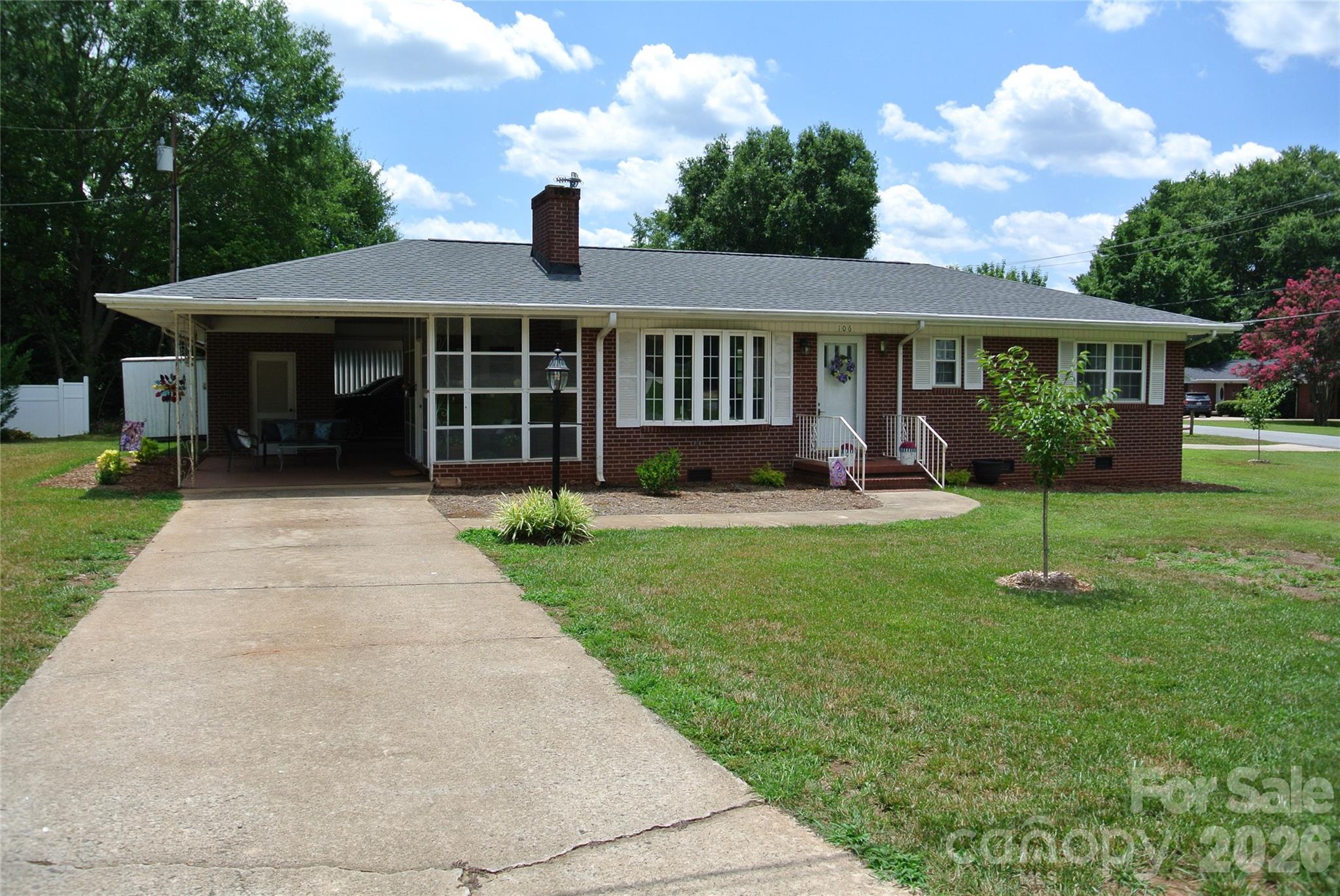 Absolutely adorable, move-in ready brick home in fantastic location. Close to Crestview park, walking trails, hospital, downtown Rutherfordton, Shopping and restaurants. This home has been tastefully remodeled. featuring a new roof, updated plumbing, updated electrical, new countertops, new appliances, new water heater, new gas logs, completely remodeled bathroom with walk-in shower, new floor covering, fresh paint and tons of updated landscaping including large tree removals. The exterior features also include, two separate attached carports with their own driveways for great parking and a cute Glass/screened in side porch for enjoying the beautiful western NC weather. Must see to fully appreciate.