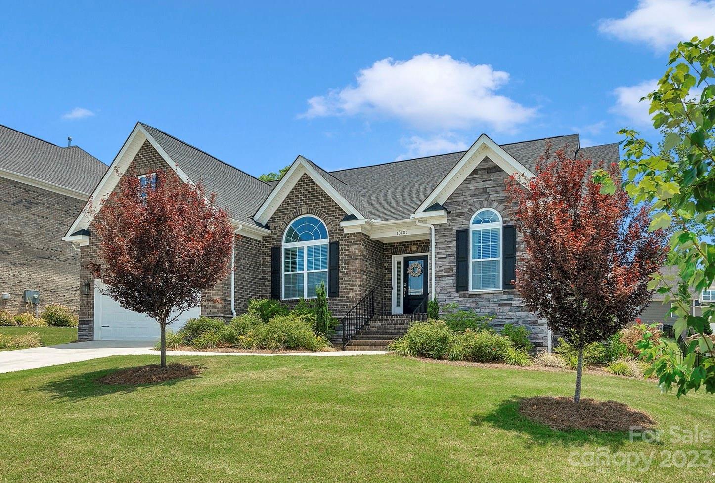 Wow! Is what you're going to say when you walk into this gorgeous 4 bed/3.5 bath home that shows like a model! The highly sought out neighborhood of Grantham has very few homes ever listed and this 1.5 story home has the primary on the main! As you make your way into this spacious open floor plan layout you will see the dramatic stone fireplace, coffered ceilings and the Gourmet Kitchen! 42" Echelon Alpine White Cabinets, Gas Range and a large Quartz Island to tie it all together! Butlers pantry and Breakfast nook are a few other highlights on the main! The Primary bedroom includes a tray ceiling and a sitting room to make for a great space! Gorgeous Primary Bathroom wont disappoint! The Farm Door in the kitchen leads to 2 other large secondary bedrooms and the staircase to a large bonus room, full bedroom and full bath, the options are endless! But your favorite spot might just be the screened in back porch! TV and Projector screen available for sale! Play set is included as well.