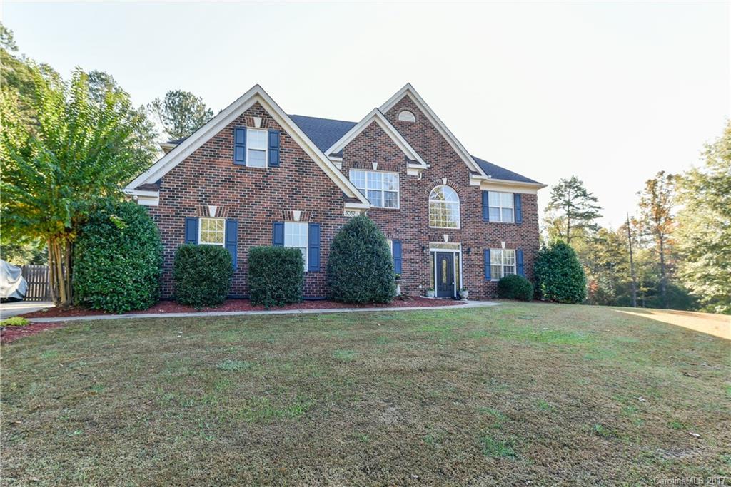 Gorgeous home tucked away 1.7 acres at the end of a cul de sac.  Beatiful foyer with curved staircase.  Formal living room, dining room and den.  Large kitchen with granite counters and stainless appliances.  Master suite has sitting area and master bath features elevated garden tub and separate shower.  Bonus room upstair perfect for relaxing or hobbies.  Relax or entertain out back in the in-ground pool with beautiful covered patio. Outbuilding for extra storage So much sq ft for the money!