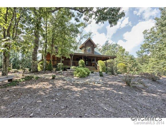Michael Champion QUALITY BUILT Log Home meticulously maintained. PRIVATE. Wrap Covered Porch beckons you to stay. DETAILS! Fire Pit & Picnic Area. Ample parking. Natural Log interior. Custom Hand Painted Cabinets. Rustic Countertop, Knotty Pine Walls. Open Loft. Custom Staircase. Hand-peeled Natural Wood Railings.Being Offered FULLY FURNISHED. Purchase TURNKEY with Furnishings.