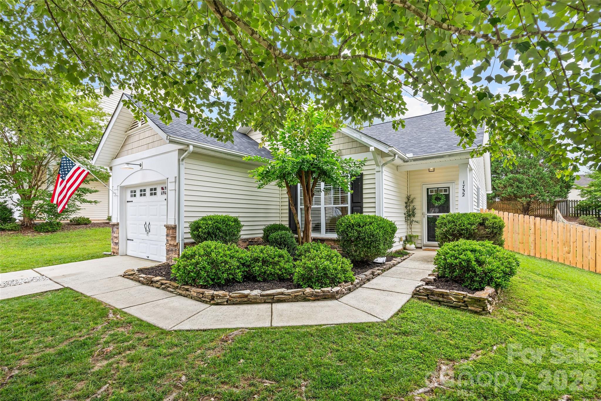 Step inside 1732 Crabapple Tree Lane and experience a home where comfort meets effortless style. This inviting residence in Riverbend offers 3 bedrooms and 2 full baths across 1,339 sqft of bright, open living space. The great room, anchored by a gas log fireplace, seamlessly connects to the dining area and modern kitchen, creating a natural gathering spot for family and friends. Sunlight fills every corner, highlighting the rich flooring and thoughtful design, while the primary suite offers a private retreat with a spa-inspired bath. Find peace of mind with a new roof installed this year. Outside, enjoy a stone and vinyl exterior, attached garage and a fully fenced backyard perfect for entertaining or relaxing in privacy.  This home blends modern comfort with practical living. Conveniently located, this home is a perfect opportunity to enjoy a functional, stylish home in a welcoming community.