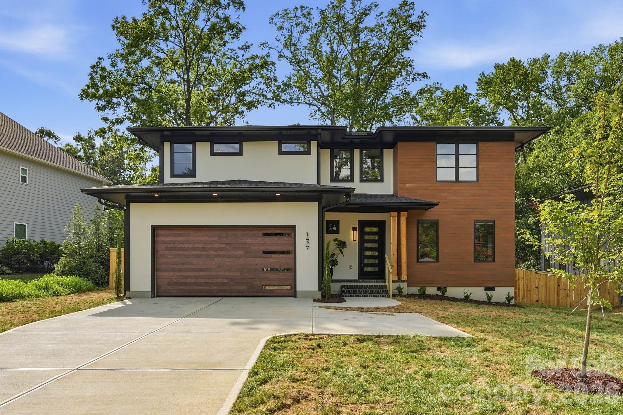 Modern design, thoughtful functionality, and a highly desirable Charlotte location come together in this exceptional new construction home. Situated on a 0.35-acre lot, this home offers just under 3,400 square feet of well-designed living space with flexible areas suited for a variety of lifestyles.

The dramatic two-story living room creates an impressive first impression with vaulted ceilings, abundant natural light, and a sleek electric fireplace. The open-concept layout flows seamlessly into the kitchen, where almond cabinetry, quartz countertops, a large island, walk-in pantry, and 48-inch gas range create a space designed for both everyday use and entertaining.

The main-level primary suite offers a private retreat, complete with a spacious walk-in closet connected directly to the laundry room and a spa-inspired bath featuring a wet room with a freestanding tub and walk-in shower. A pocket office and convenient drop zone complete the first level. 

The upper level features a generous media room and three secondary bedrooms served by two full baths. One bedroom enjoys a private en-suite bath, while the remaining two share a well-designed Jack-and-Jill bath with separate vanities.

A covered rear patio overlooks the spacious fenced backyard, offering plenty of room to enjoy the space. Optional pool package available. 

Conveniently located from Cotswold, Plaza Midwood, SouthPark, and Uptown Charlotte, this home is nearby shopping, dining, entertainment, and major commuter routes. Additional features include a two-car garage with EV charger and a tankless water heater.

Tax value subject to change upon completion.