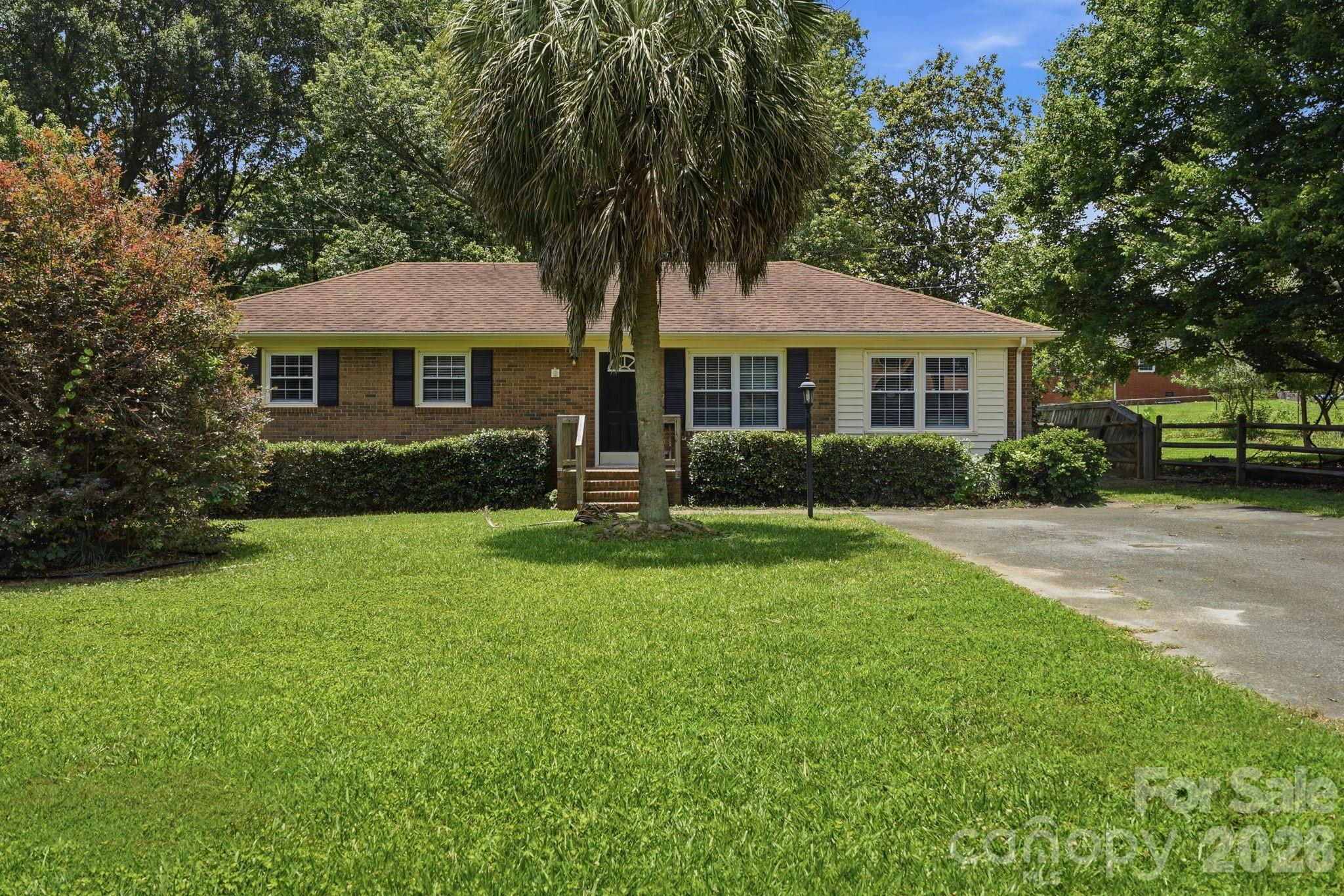 Don't miss this charming home featuring 3 bedrooms and 2 bathrooms with a comfortable layout designed for everyday living. The spacious living areas provide plenty of room to relax and entertain, while the bedrooms offer flexibility for family, guests, or a home office. Step outside to enjoy the covered wood deck porch, perfect for outdoor dining, morning coffee, or relaxing evenings. Situated on a spacious lot, the property also includes a separate shed/shop offering excellent storage, workspace, or hobby potential. With ample outdoor space and endless possibilities, this property is ready for its next owner. One or more photo(s) have been virtually staged.