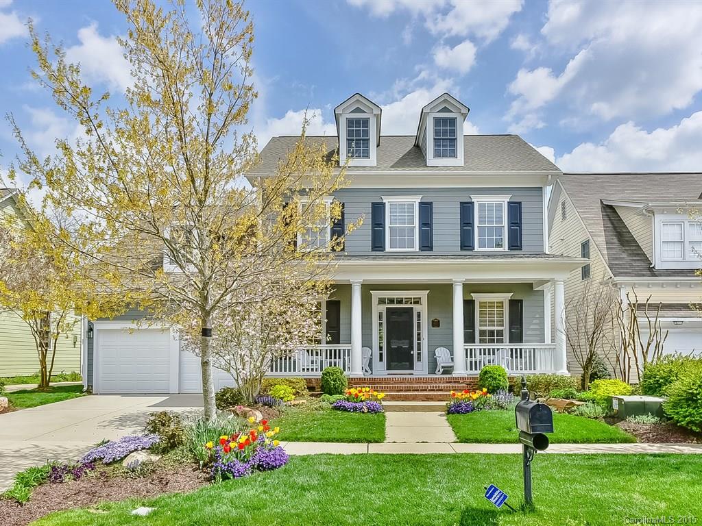Ooh! Stunning Beauty in Amenity Rich Baxter with Private Veranda with Stone, Gas Fireplace! Front Porch, lush lawn w/ mature foliage & wooded, private back yard, irrigation, invisible fence & security. Pristine Home Featuring: Elegant Master on main, 2 Story GR w/ open staircase & fp, Kitchen w/ granite, tile backsplash, work isl & bar, & gas stove/oven, Study w/ French doors & built-in desk. Speakers in Kitchen, M Bath, DR & Veranda.  Built-in Closet & Attic shelving & storage galore! MUST SEE!