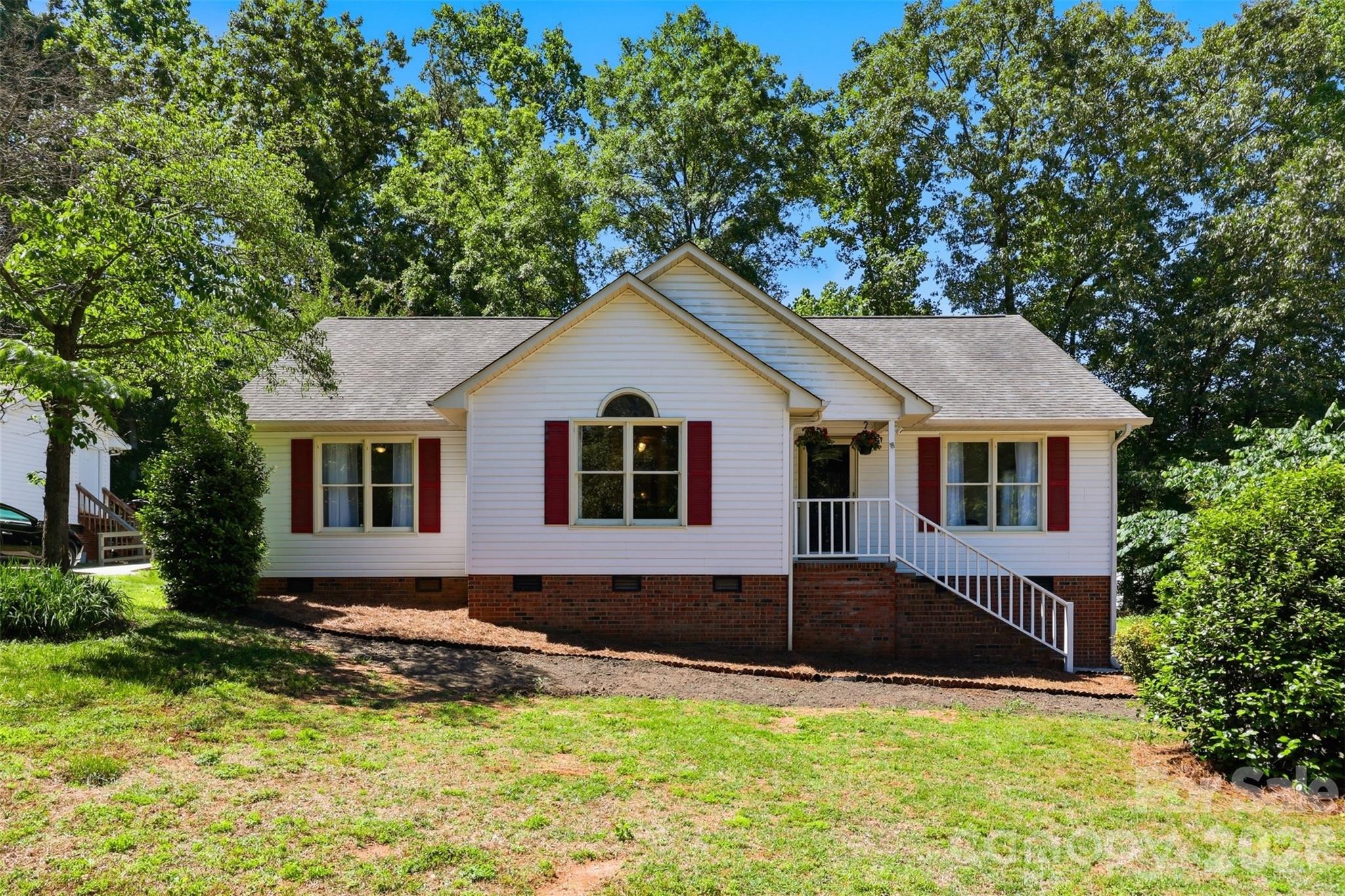 Welcome home to this Ranch home in the heart of Fort Mill! This 3-bedroom, 2-full bath home offers a split floor plan, vaulted family room with fireplace, spacious kitchen w/breakfast area, roomy laundry. Outside, you'll find a back deck, wired workshop (12 x 20) with an additional storage shed. Located in the award winning Fort Mill School District. Scheduled your showing today!