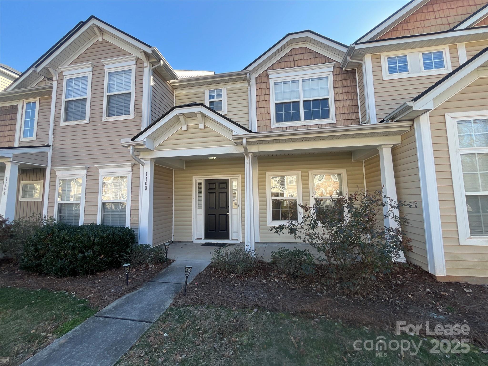 This gorgeous 2 bed, 2.5 bath town home in the Constitution Park community of Rock Hill, SC is just waiting for you, with newly installed brand new luxury vinyl flooring! This home features a great room with vaulted ceilings and a fireplace with a TV niche and a separate dining area. The open kitchen is adorned with wood cabinetry, a white appliance package, a walk-in pantry and a breakfast bar. A half-bath is also located on the main floor. The primary bedroom boasts vaulted ceilings and an en suite bath. The second bedroom also has it's own bath, perfect for roommates. The laundry room includes a stackable washer and dryer for resident use. There is also an outdoor patio and storage shed for your convenience. Don't miss this lovely home close to shopping and dining, and just 25 minutes from uptown Charlotte! Community amenities include a gazebo, playground and soccer field.