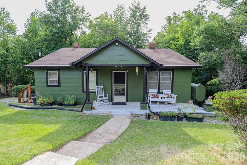 Welcome to your own private woodland retreat! Nestled on a peaceful 1.17-acre lot, this charming 3 bedroom, 1 bath home offers warmth, character, and the perfect setting to unwind. Spend your mornings or evenings relaxing on the back deck overlooking the serene wooded backyard, where privacy and nature surround you.
Inside, you'll love the cozy ambiance created by the wood-burning stove, perfect for gathering around during cool mountain evenings. While the home could use a little TLC and offers a wonderful opportunity to add your own personal touches, it has great bones and plenty of potential to become a cozy full-time residence, mountain getaway, or investment property.
Conveniently located less than 10 minutes from Fonta Flora Trail and public access to beautiful Lake James, and less than 15 minutes from downtown Morganton, you'll enjoy easy access to hiking, biking, kayaking, boating, shopping, dining, and all the outdoor recreation Western North Carolina has to offer.
If you've been dreaming of an affordable home with privacy, acreage, and endless possibilities in a sought-after location, this hidden gem is one you won't want to miss!
