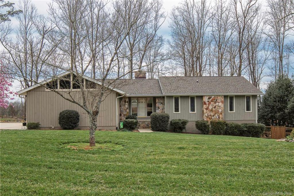 Beautiful home & setting!  Loaded with upgrades - granite, new custom cabinets, lighting, hardwood flooring, custom closet inserts, sunroom, Trex decking, screened porch, patio....much more.  Basement is finished with BR, BA, Kit and Den - could be second living quarters. Large lot, fenced, tree buffer.