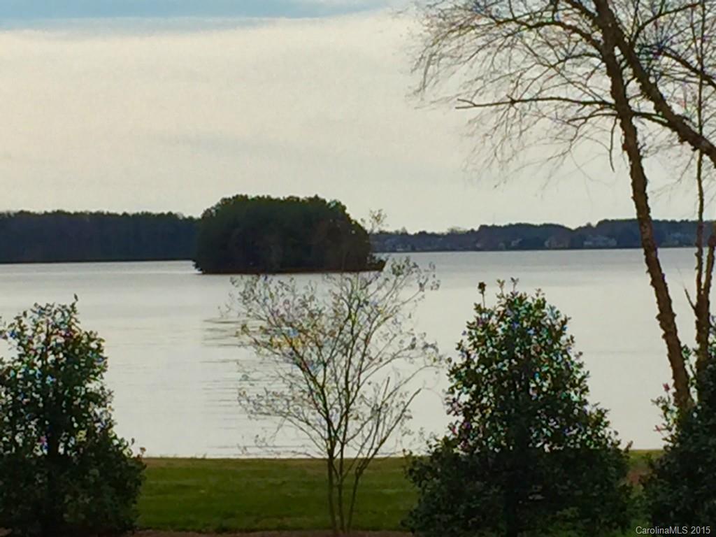 Excellent main channel TRUE WATERVIEW lot just outside of The Point!  Property is a flat approximately 1 acre parcel ideal for a custom home build. Membership opportunities in Trump National Golf Course also available. This lot is on a lightly traveled road with beautiful homes and NO HOA's!!!