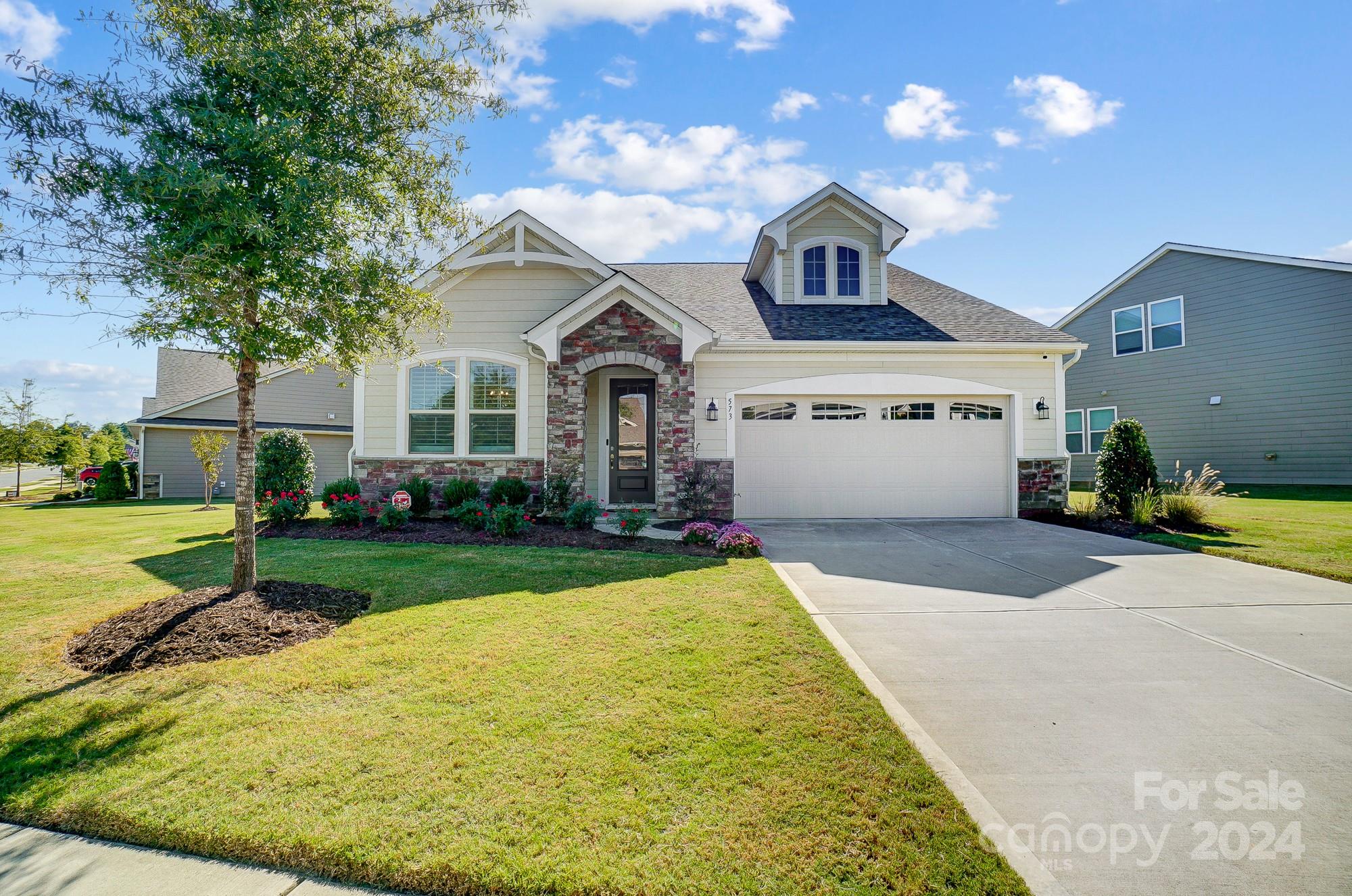 Beautiful 1.5 story home with 3 bedrooms and 3.5 baths.  Floor plan features an open kitchen with large island and first floor owner suite with laundry attached to owner's closet.  Full guest suite with full bathroom. Cozy sunroom and formal dining room at the front of the home. Outdoor patio, screened in porch and fully fenced yard. Some great additions are the plantation shutters and crown molding throughout. On the second floor is another guest room with full bath, large bonus and multiple storage areas. Cadence is just minutes from shopping centers, parks, water activities and everything else that beautiful Tega Cay has to offer. Lawn maintenance & irrigation system care included in the HOA.
