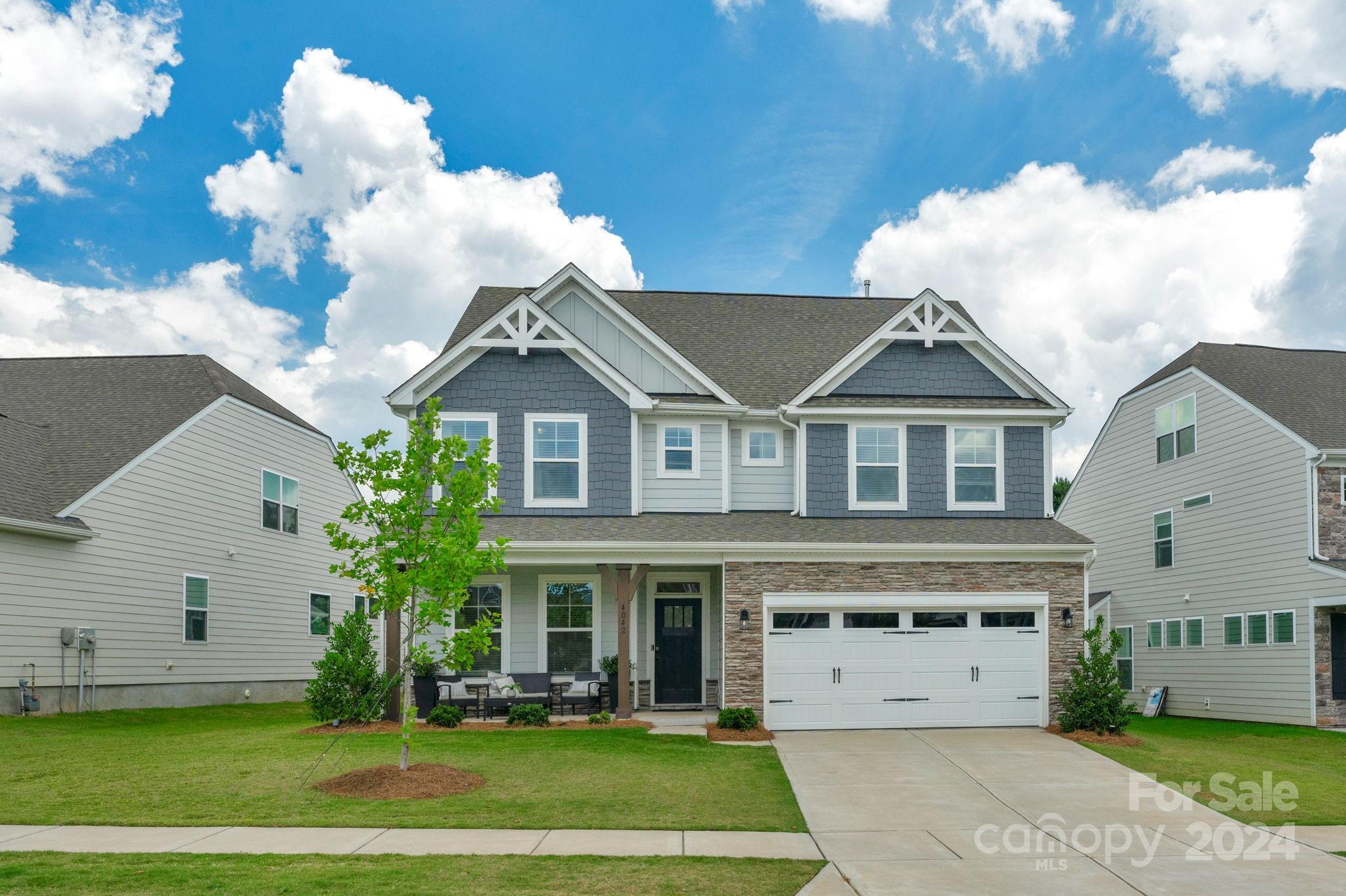 Don't miss the opportunity to purchase this stunning 6 bedroom 4.5 bath 2022 Eastwood home. Meticulously maintained with upgrades galore this home has everything you have been looking for. An incredible outdoor living space with pool, firepit, paved patio, screened porch, privacy fence with access to walking trails. On the main level there is a gorgeous kitchen with white cabinets, gray island, quartz countertops, modern tile backsplash, stainless steel appliances that include gas cooktop. On the main floor you will also find a dining room, family room with feature gas fire, a guest suite with full bathroom, mud room and an additional half bath. On the second floor you have the primary suite with luxurious bathroom an additional 3 beds with bath and a huge loft. The third floor can be used as a bed/bonus and has its own full bath. 5 gig internet via fiber available. This incredible house also has access to resort style amenities including pools, clubhouse, tennis courts and much more.