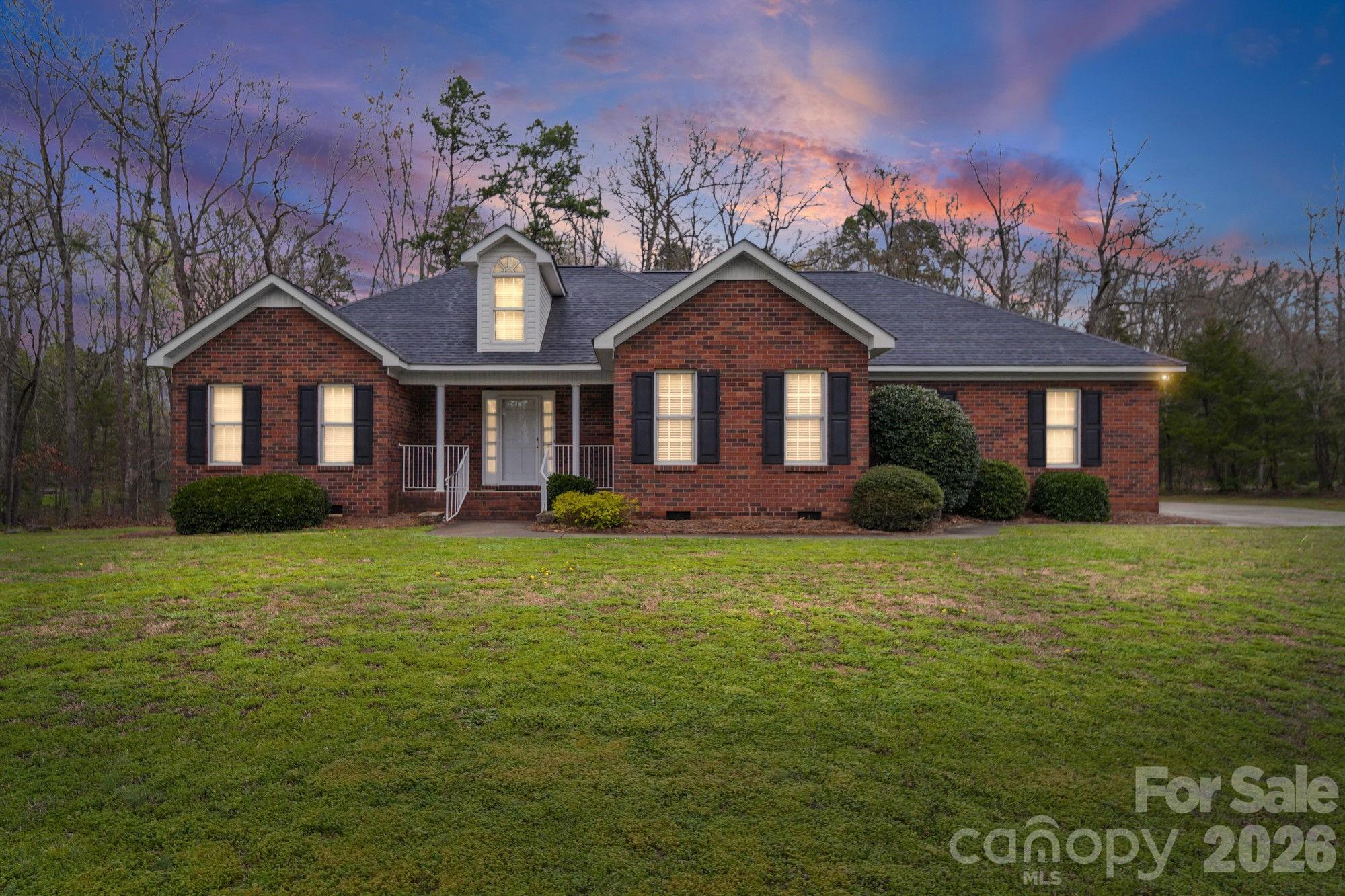 Step into 410 W. Elm St.,  a home that feels both grounded and welcoming from the moment you arrive. This
3-bedroom, 2-bath brick residence offers timeless curb appeal paired with a layout designed for
real living. Walking distance to Wingate University, Wingate Community Park and less than 5 minutes to the interchange of the Monroe Expressway.  Inside, you'll find a spacious living room anchored by a cozy fireplace, perfect for quiet evenings or gathering with friends.
The kitchen flows seamlessly into a bright breakfast nook, while a dedicated dining room sets
the stage for more formal moments. A sunroom filled with natural light invites you to slow down
and enjoy peaceful views of the backyard, while the back deck offers the perfect extension for
outdoor living. The primary suite provides comfort and privacy, complete with a well-appointed bath featuring a
soaking tub and separate shower. With two additional bedrooms, a full bath, and a convenient
laundry room, the layout balances function and flexibility.
Complete with a garage and thoughtful design throughout, this home is ready for its next
chapter.