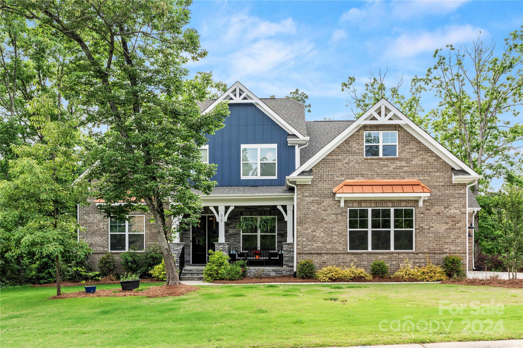 Discover your dream home in the Retreat at Sunset Ridge neighborhood! This stunning home is a must-see for anyone looking for luxury living. With a spectacular backyard with a firepit area and screened-in porch, this home is perfect for relaxation and entertainment. Inside, you will find a primary bedroom on the main floor, four bedrooms, three and a half bathrooms, an upgraded kitchen with Kitchenaid appliances. The large bonus room is perfect for movie nights or game sessions, while the mudroom with a drop zone and first-floor laundry room provide added convenience. The Retreat at Sunset Ridge is a top-rated community with a community pool, clubhouse, and limitless recreational activities at the lake, just minutes away. Plus, with excellent Clover schools, and shopping destinations nearby, this home is the perfect choice for those who want to experience the ultimate lifestyle. Don't wait any longer to experience the magic of this home - schedule your viewing today!