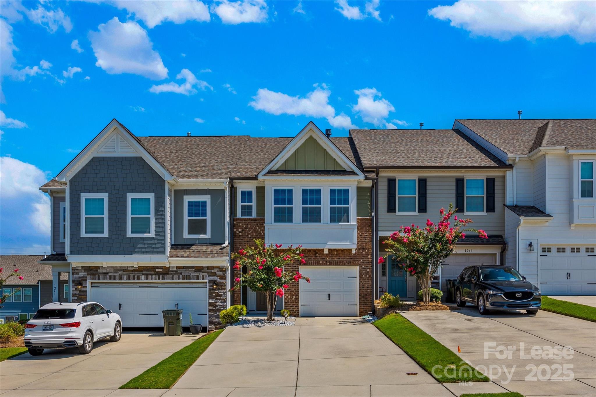 Gorgeous 3-bed, 2.5 bath townhome in Desirable Paddlers Cove of Clover! This home is move-in ready. The Home has an open floor plan on the main level with the living, dining, and kitchen areas. The kitchen boasts SS appliances, granite countertops, a pantry, ample counter and cabinet space. The upper level is carpeted and has all three bedrooms. The Primary suite is a true retreat with a tray ceiling, WIC w/built ins, and a lovely ensuite bath. The bath features a double sink vanity and step-in shower. The secondary bedrooms are nicely sized and share a full hall bath with a shower/tub combo and a double sink vanity. The laundry room is also on this floor and has a nice cabinet and shelving. The backyard is enclosed and private. There is little to no maintenance with the large patio, a pergolo, rock landscaping, and astro turf. It would be tenants responsibility to remove weeds and maintain inside the back fence. Pets Conditional. **No Cats** Owner would consider 6, 9, or 12 month lease options.
