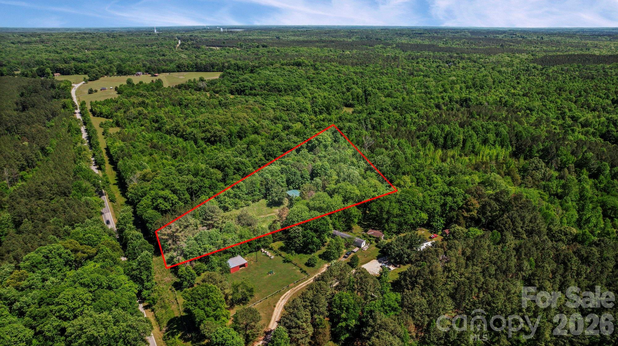 ***SELLERS ARE HIGHLY MOTIVATED*** Well, septic and power already on-site.

Discover the perfect blend of privacy and convenience with this 4.28-acre tract on Old Richburg Highway. Tucked away and surrounded by nature, this property offers a peaceful, secluded setting just minutes from I-77, giving you easy access while still feeling miles away from it all.

Featuring a mix of wooded landscape and rolling terrain, this property offers abundant opportunities. Whether you’re dreaming of building your own private homesite, creating a weekend retreat, or setting up a small-scale equestrian space (buyer to verify), there’s room here to bring your vision to life.

Enjoy the freedom of land ownership with space to spread out, explore, and make it your own - without sacrificing proximity to major routes and nearby conveniences.

The property includes a mobile home, storage shed, and RV - all conveying at no value and as-is.