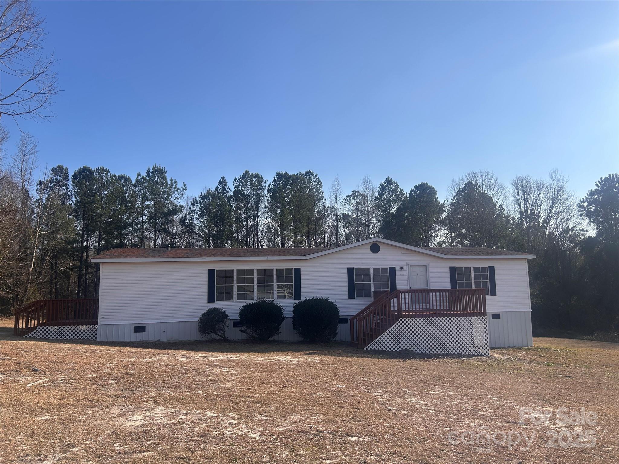 This home is a must see. Beautiful single family home with 2.29 acres of land is located in Columbia SC. Home consist of  an open floor plan with three bedroom and two full baths with lots of closet and storage space. Home also consist of natural light throughout. The Living room has a beautiful fireplace with plenty of room for entertaining.  The kitchen has an open concept as well with plenty of storage space and natural wood cabinets. If you are looking for a single family home with land then look no further. This home is the perfect home for you. There is an overwhelming amount of outdoor space for entertaining.