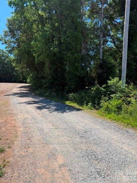 Beautiful, wooded tract consisting of approximately 0.93 +/- acres located off Morgan Mill Road in Monroe. This private parcel is accessed by a recorded right-of-way and offers an excellent setting for your future home or weekend retreat.  Wooded lot, the property provides a peaceful and secluded atmosphere while still being conveniently located near Monroe and surrounding areas.

Ideal for buyers seeking privacy, nature, and a quiet residential setting. Bring your builder and vision to create the perfect custom home tucked away among the trees.

Features
Approximately 0.93 +/- acres
Wooded lot
Private setting
Access by recorded right-of-way
Great location for residential dwelling
Convenient access to Monroe, shopping, dining, and schools
Excellent opportunity for custom home site or investment property

Buyer to verify utilities, septic suitability, survey, and any applicable restrictions.