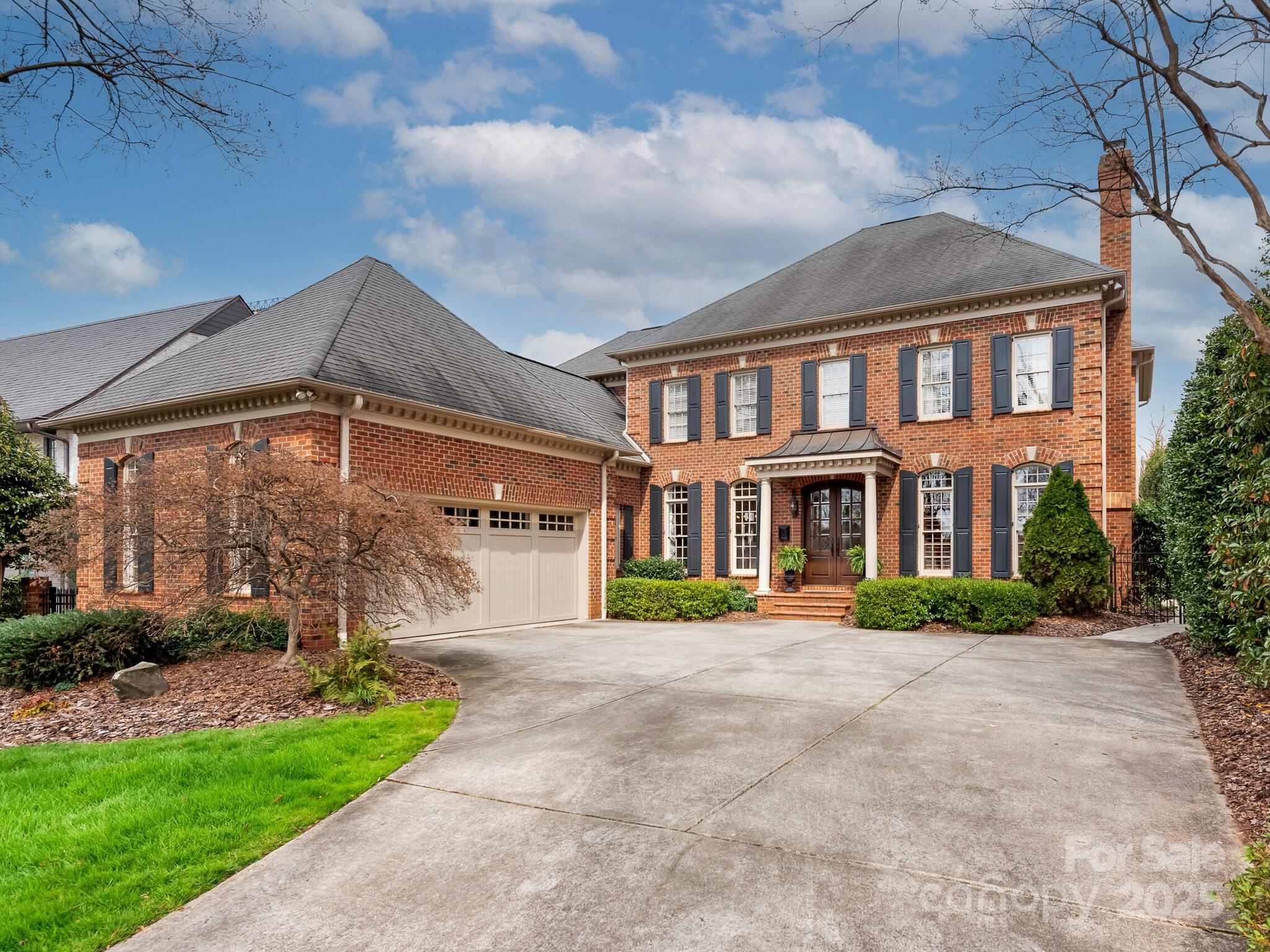 Beautiful traditional home in the heart of Myers Park. Enter the welcoming foyer with a paneled study with gas log fireplace on your right. The large dining room has grasscloth paper and nice wood details. The kitchen features leathered granite countertops, glass tile back splash, SubZero fridge, double Wolf ovens, beverage fridge, built in microwave, six burner Wolf cooktop with griddle, touch faucet, ample cabinetry and storage. Casual dining area with motoroized shades overlooks gorgeous back yard. Den with large custom built in, gas log fireplace and wall of windows. Primary on main with updated bath. Upper level features large bonus room and four additional bedrooms (5th bedroom currently used as an office). Walk in attic storage. Excellent outdoor living with both covered and open air patio with retractable awning, two overhead heaters and fireplace. Built in grilling station. Pool with hot tub and new filter. Storage shed, fenced yard, irrigation. Security system. Central vac.