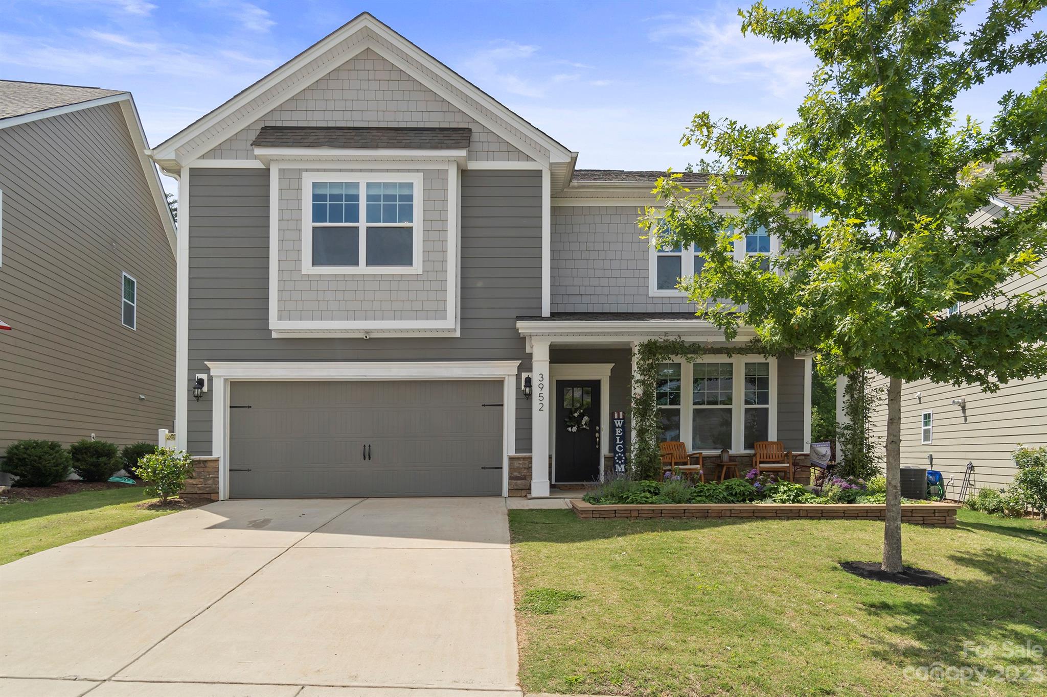 Exactly what you've been looking for! This 5-bedroom 3.5 bathroom stunner is nestled on a quiet cul-de-sac street in the desirable Bridgewater community of Sherrills Ford. You will not find a more pristine home inside and out!  Excellent for entertaining, this home is flooded with natural light and open spaces. With nearly 3,000 well allocated square feet, each room has the perfect blend of form and function. Kitchen features large island, granite counters, 42" cabinets, large pantry, and stainless appliances. Primary suite on main level overlooks gorgeous backyard garden, and hosts large en-suite with soaking tub, shower, water closet, and dual vanity. Upstairs you'll find 4 additional large bedrooms, two full bathrooms and massive loft space. On one of the best lots in the neighborhood, sellers have created a natural backyard oasis, complete with outdoor kitchen, covered patio, fire pit, retaining wall and new sod! Checks every box! Schedule your tour before it's too late!