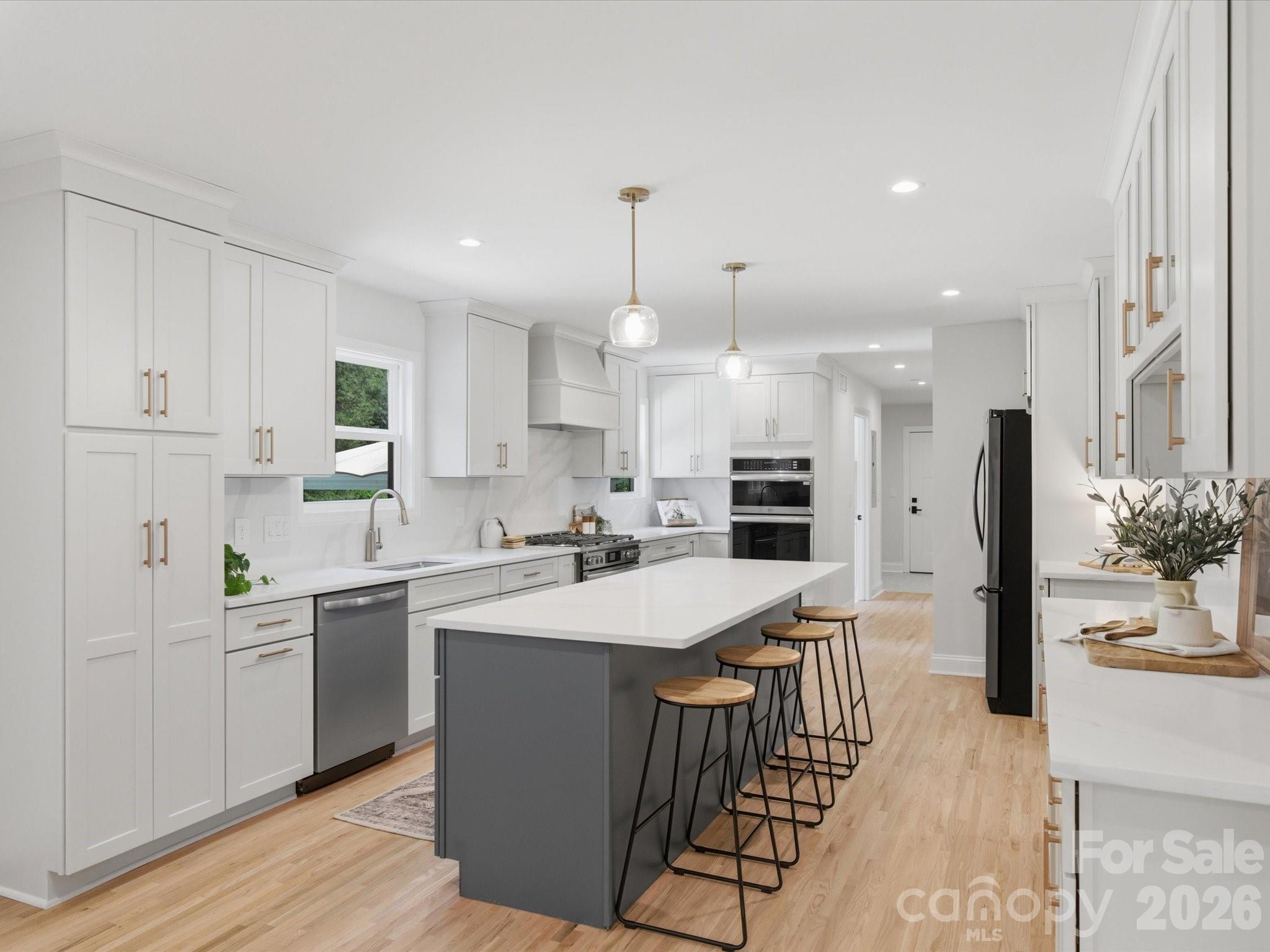 Rarely does a home offer the soul of a classic estate with the precision of new construction. Taken down to the studs and masterfully reimagined, this SouthPark area gem sits on a sprawling 1/2-acre lot featuring a private pool. The open-concept interior boasts refinished hardwoods and a chef’s kitchen with stunning quartz countertops. Designed for modern flexibility, the layout supports true multigenerational living with a coveted Primary Suite on the Main and a total of 5 spacious bedrooms in addition to a bonus room and 4.5 baths. Practicality meets luxury with two dedicated laundry rooms, two offices, a flex space, a new roof, and new HVAC, and a encapsulated crawl space. Enjoy the peace of a massive lot just minutes from world-class shopping and dining. Truly a "new" home with character you won’t find in a subdivision. Home has an additional full bathroom that can be accessed from the pool deck. Don't miss this one!