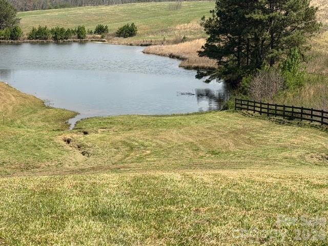 3.49 ACRES OF COUNTRY LIVING, JOINING A POND.
Escape to serenity on this sprawling 3.49-acre property nestled in the heart of the countryside joining and overlooking a charming pond. Surrounded by picturesque landscapes and neighboring larger acreage tracts, this idyllic retreat offers the perfect blend of privacy and community. Embrace the tranquility of rural living while being just a stone's throw away from the beauty of nature and the charm of farming life. Don't miss this opportunity to own your slice of country paradise! This property has road frontage on Lamb's Grill Road. It is approx 6.2 miles to Chesnee, SC and approx 18 miles to Forest City NC and Spartanburg SC. It is conveniently located approx 13 miles from the Tryon International Equestrian Center and approx 3.1 miles to Strawberry Hill.