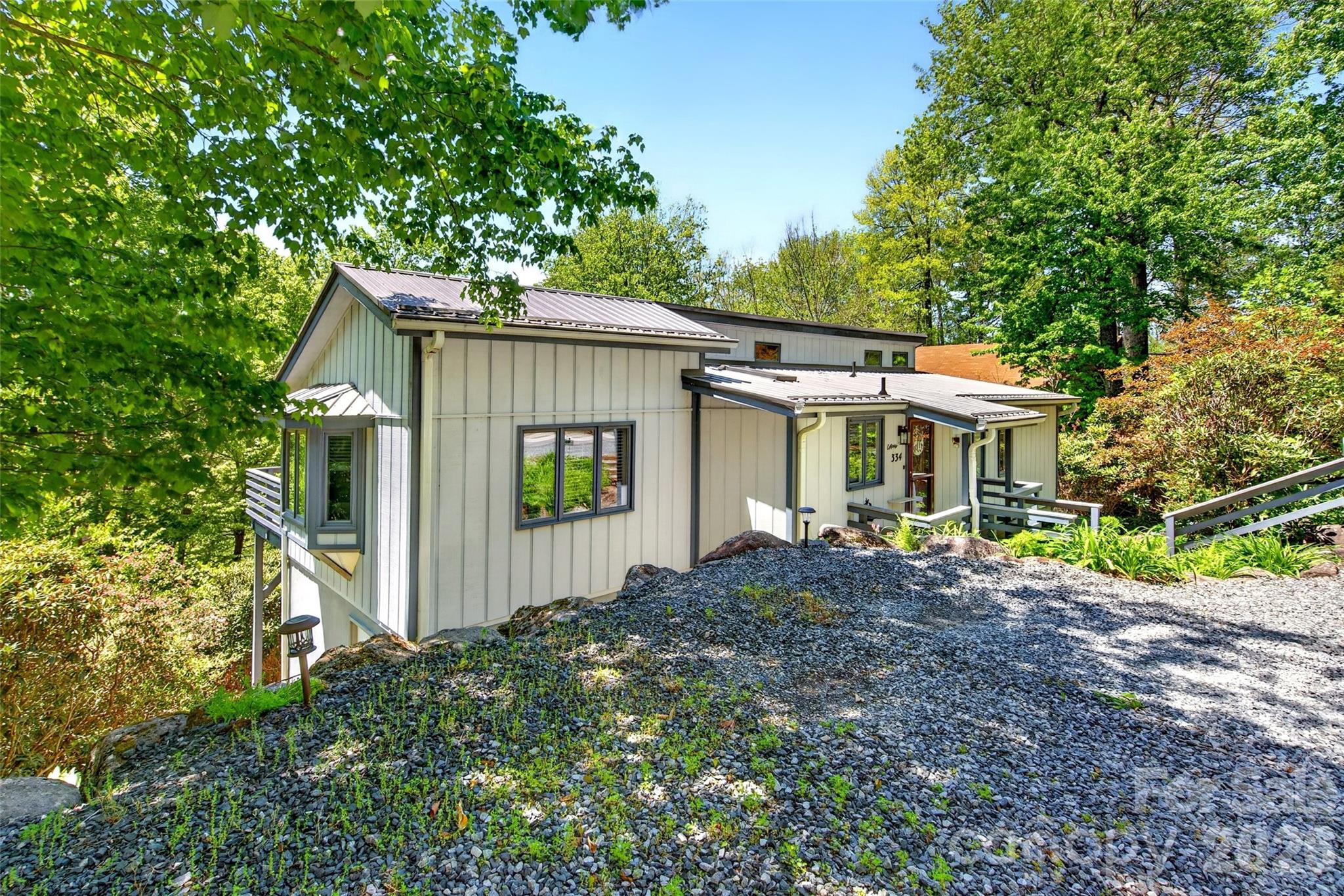 Turn-key opportunity in Linville Land Harbor! This beautifully maintained, fully furnished home offers 2 bedrooms, 3 baths, and a flexible layout with the primary bedroom on the main level—making it ideal for both personal use or investment.
Recent updates include a new metal roof and two new mini-split systems, providing efficiency and comfort year-round. The home features abundant natural light, gas log fireplaces, and a spacious deck perfect for enjoying cool High-Country evenings. A large workshop offers added versatility and could easily be converted back into golf cart storage if desired.
The property is beautifully landscaped and includes a generous storage area beneath the home, along with the potential for a third-bedroom modification or addition. This is an excellent option for investors seeking a true turn-key property or buyers looking for a low-maintenance mountain retreat.
Linville Land Harbor amenities include golf, pickleball, tennis, shuffleboard, hiking trails, pool, fishing, dog park, and 24-hour security—offering something for everyone. Come experience all the High Country has to offer!