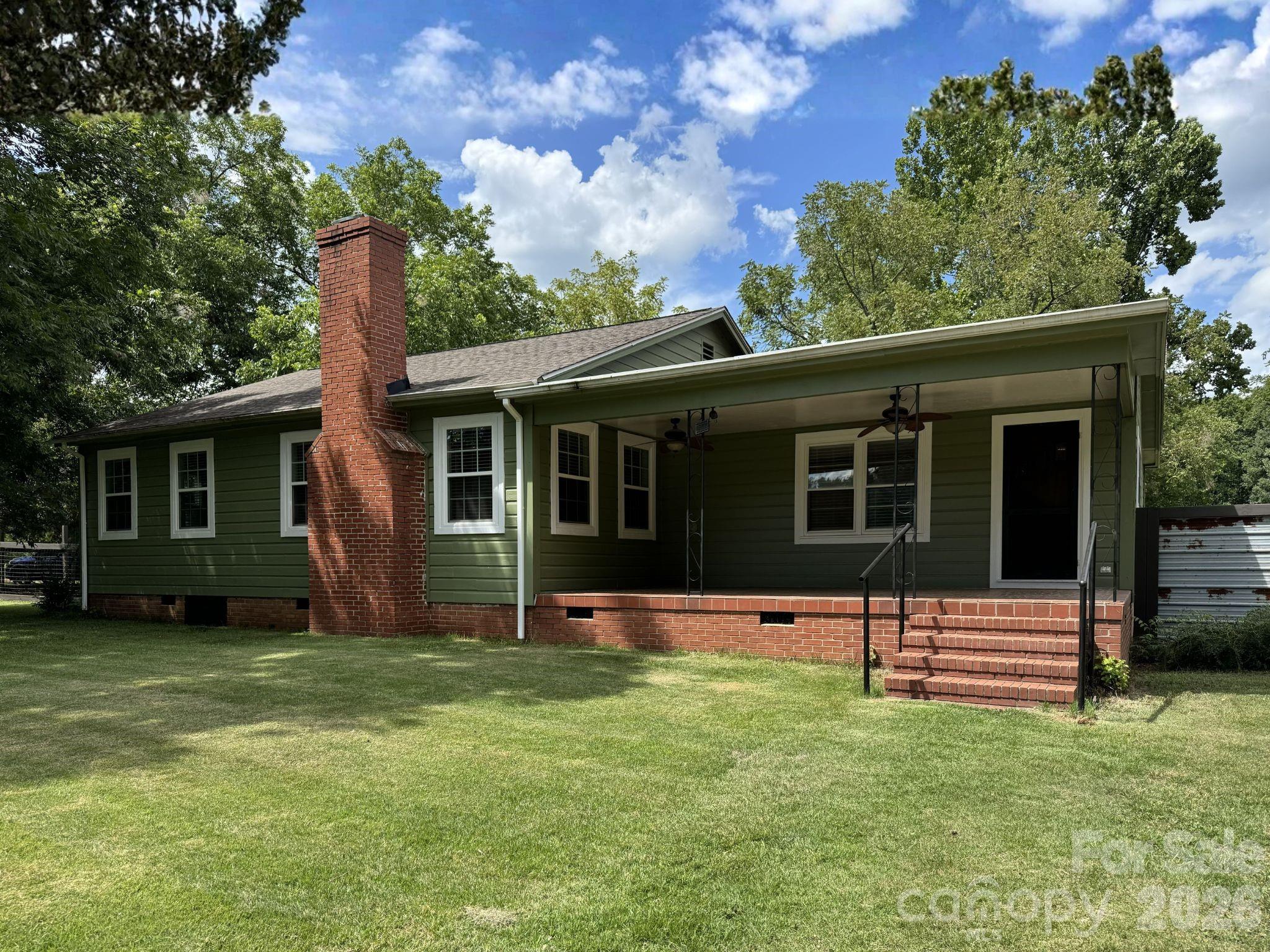 Rare opportunities like this don't come along often! This unique property offers the best of both worlds—a comfortable 3-bedroom, 2-bath ranch home and GC commercial zoning, giving you the flexibility to live and run your business from the same property.

Full of character, the home features hardwood floors, classic moldings, two wood-burning fireplaces, and a spacious open kitchen, dining, and great room addition. The oversized primary bedroom, huge laundry and utility room, fresh interior paint, new roof, updated wiring and plumbing, and newer windows in portions of the home make it both functional and inviting.

Outside, enjoy a peaceful country setting with mature pecan trees, a fenced yard with gated areas for livestock or pets, a goat house, and a 40,000-gallon saltwater inground pool (18' x 36') with a liner that's just three years old.

The standout feature is the impressive commercial space: a 60' x 30' garage/shop with two roll-up doors, attached 30' x 20' office/one-bedroom apartment with LVP flooring and a mini-split. 

Whether you're a contractor, car enthusiast, small business owner, or simply need room for projects and equipment, this one-of-a-kind property offers incredible flexibility in a quiet country setting.