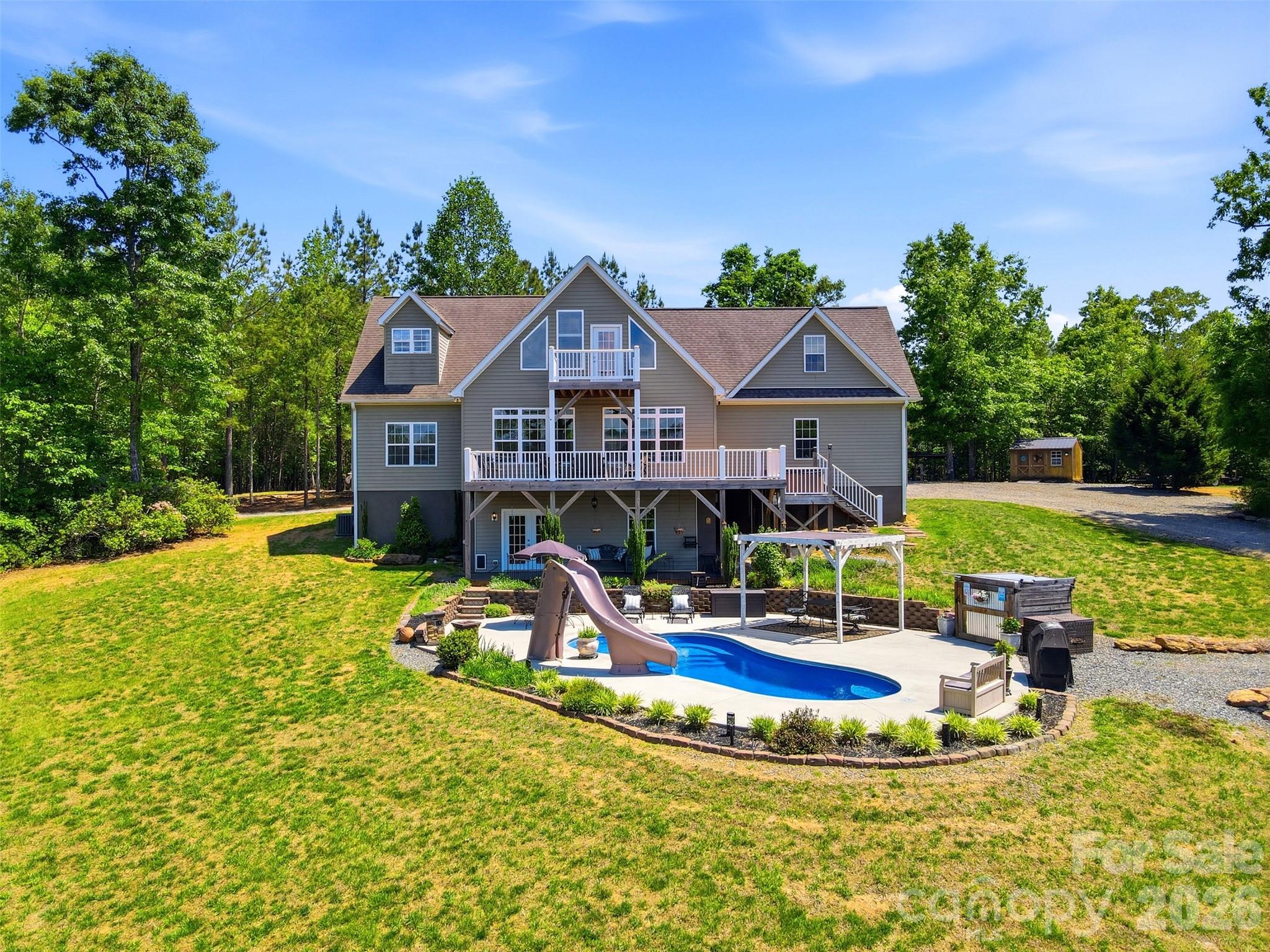 Experience the perfect blend of privacy, recreation, and versatility at 631 Sedona Rd. Nestled in a peaceful setting, this unique property offers an impressive combination of indoor comfort and outdoor amenities designed for both everyday living and entertaining.

Outside, the property truly shines with its own private creek, wooded walking trails, and natural surroundings that create a serene retreat-like atmosphere. Whether you enjoy exploring nature, relaxing by the water, or entertaining outdoors, this property offers endless opportunities to enjoy the outdoors right from your backyard. The entertainment area features a hot tub, indoor sauna, and in ground pool, making it the perfect place to host guests or unwind after a long day.

Inside the home, you’ll find spacious living areas with a layout designed for flexibility and functionality. A dedicated wet bar provides the ideal setup for entertaining, game nights, or creating the ultimate lounge space. The upstairs level offers the potential to function as a completely separate living quarter, making it ideal for multi-generational living, long-term guests, a private suite, or possible rental opportunities.

Additional features throughout the home add both comfort and convenience, while the surrounding wooded acreage provides privacy and a true mountain retreat feel. With a rare combination of recreation, relaxation, and flexible living space, this Nebo property offers a lifestyle that is difficult to find.