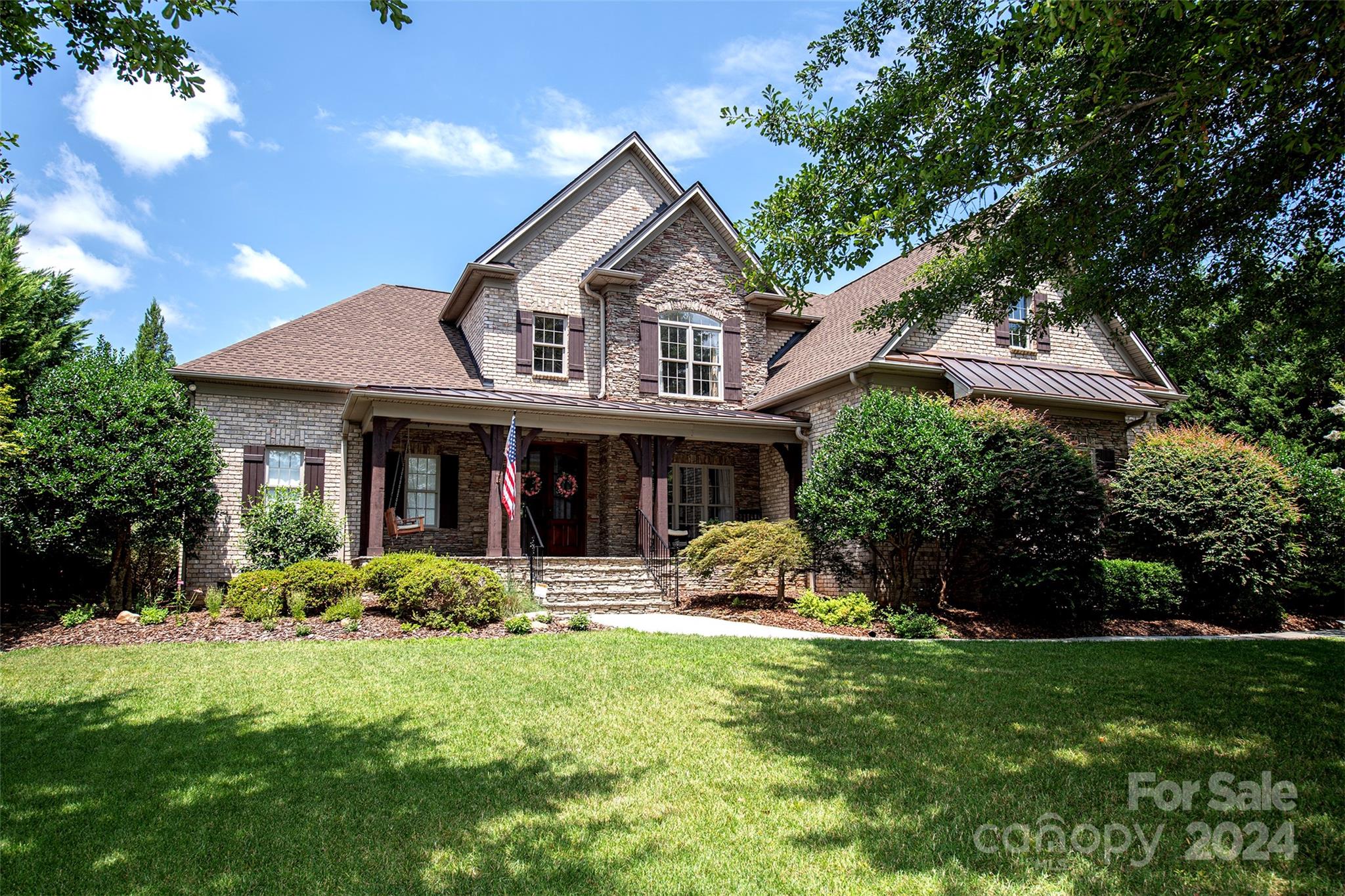 Stunning home in highly desirable Laurel Creek neighborhood.  Located on a quiet street, this home has excellent curb appeal! Elegant 2-story foyer opens to gorgeous dining room w/trey ceiling that leads to the spacious great room with coffered ceilings, fireplace, and built-ins. The chef's kitchen has a large island, SS appliances, gas cooktop, granite countertops and flows into the sunny breakfast area and keeping room also with stacked stone fireplace.  The primary suite offer tons of natural light, gleaming hardwood flooring, double trey ceiling, sitting area, HUGE closet, fabulous bath with dual vanities, shower and tub. The secondary bedrooms are located on the upper level and are all ensuite with large closets and hardwood flooring.  There is cozy bonus/media room with wet bar. Walk in attic. Other features include a covered back porch overlooking private fenced backyard, paver patio, and three car garage.  Newer HVAC, roof, water heater.  This home is a RARE find!