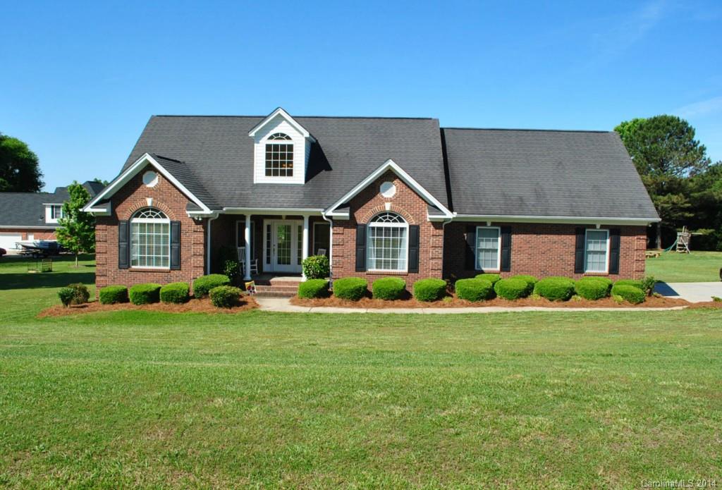 Beautifully refinished hardwood floors (May 2014) Gorgeous ceiling lines throughout almost every room. Thick moldings, spacious brick ranch plan w/bonus room. Quiet country setting yet not too far from everything and no city taxes!