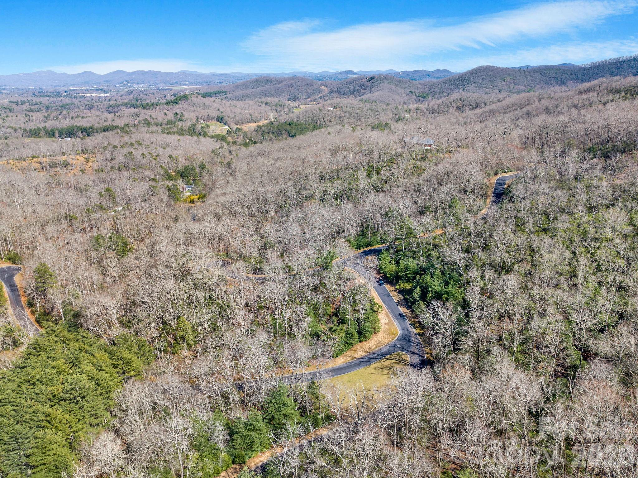 Tucked within the gates of Homestead at Mills River, this serene wooded homesite presents an exceptional opportunity to create your custom mountain retreat. Thoughtfully equipped with underground utilities and fiber optic connectivity, the property blends modern convenience with natural beauty.

Enjoy access to the River Reserve Clubhouse, nestled on 10+ acres along the Mills River—ideal for outdoor recreation, entertaining, and soaking in the mountain lifestyle. Located just minutes from Pisgah National Forest, top-rated hiking trails, and premier fly fishing waters, plus easy access to Sierra Nevada Brewery and other popular Mills River breweries.