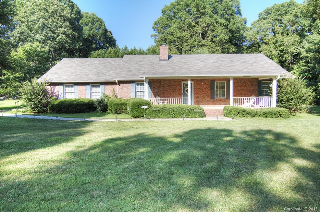 Fabulous full brick 1 story home on 1 acre private lot! Open floor plan, spacious Great Room has fireplace & adjoins Dining Room! LARGE Kitchen with lots of cabinets, gas stove and breakfast area! Master Suite has walk-in closet, Master Bath with walk-in shower! Secondary bedroom with private bath, 3rd bedroom currently used as office. Spacious utility room w/ laundry closet, half bath and large pantry. Oversized 2 car garage has storage area, screened-in porch, deck, rocking chair front porch!