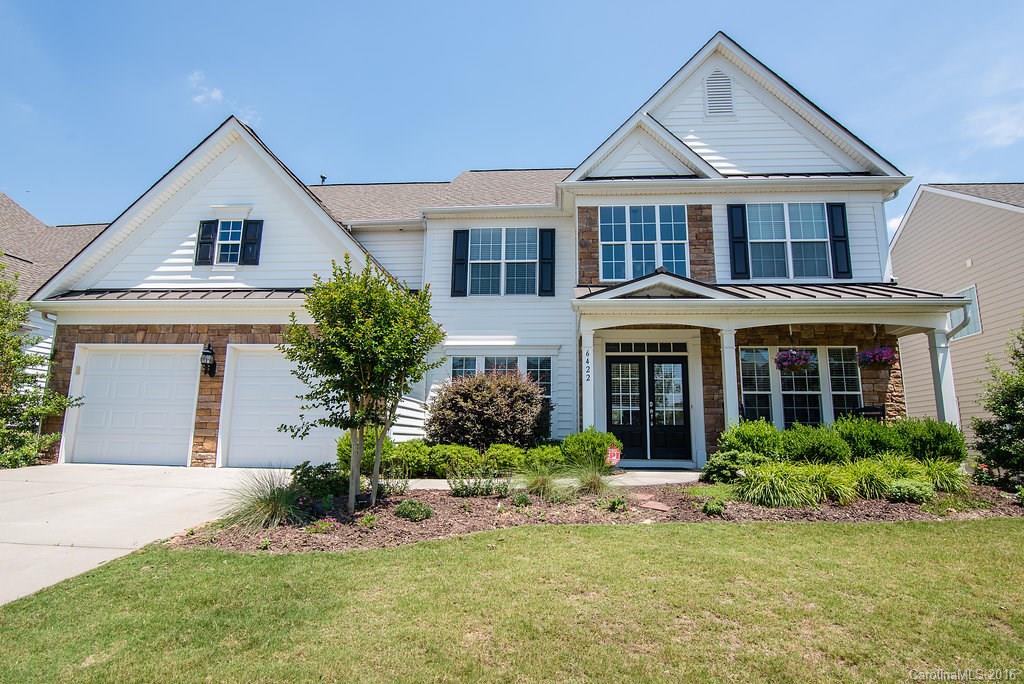 *ONLY* floorplan like this in Belair! Arched doorways, two story foyer, open kitchen/living room concept, upgraded fixtures throughout, hardwoods/main, stainless appliances, wood blinds, wet bar in master, TWO closets in master, folding table and cabinets in laundry, gas fireplace. EXTRAS: Shiplap wall, beadboard island, wrought iron spindles on stairway, custom front doors, extra canned lights added to kitchen, custom paver patio w/retractable awning, private backyard. NEW Bosch dishwasher.