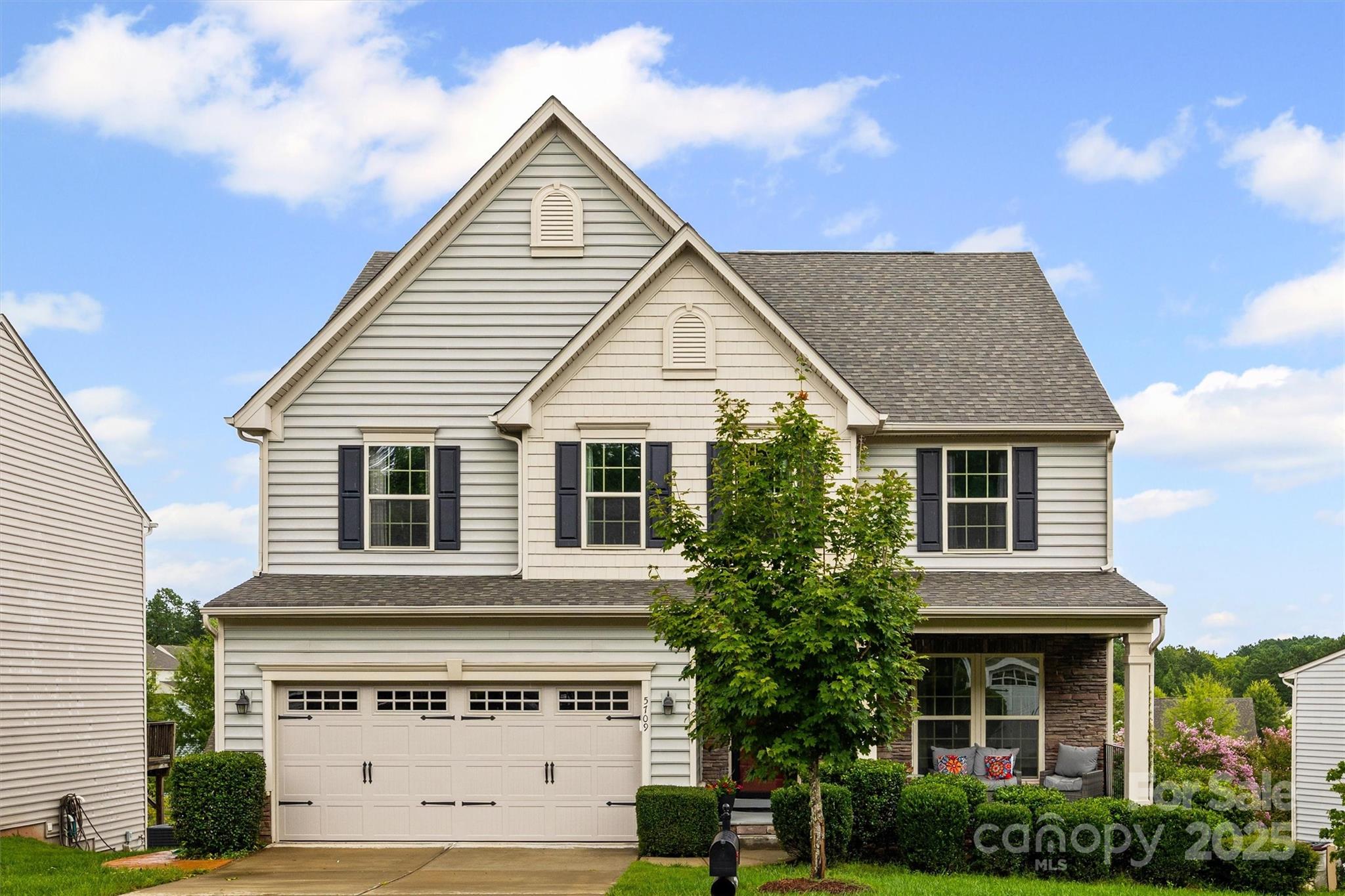 Big home with big possibilities! This 4,622 sq. ft. beauty—including a finished basement—gives you serious space and style at a smart price. Movie nights in the media room, workouts in your gym, meals in a chef’s kitchen with granite, stainless and large island, plus a sunny breakfast room and home office. Wood floors on main, neutral tones throughout & open floor plan living. Huge primary suite with sitting area, relaxing bath with large, tiled shower and 2 walk-in closets! Upstairs laundry for convenience & additional living area gives room for everyone to spread out. Wait there’s more…multi-room, finished walk-out basement with full bath to use however you like.  Three outdoor hangouts (deck, screened porch & paver patio) make entertaining easy. All in an amenity rich community loaded with pool, clubhouse, tennis court, fitness center & playground. Come discover it today!