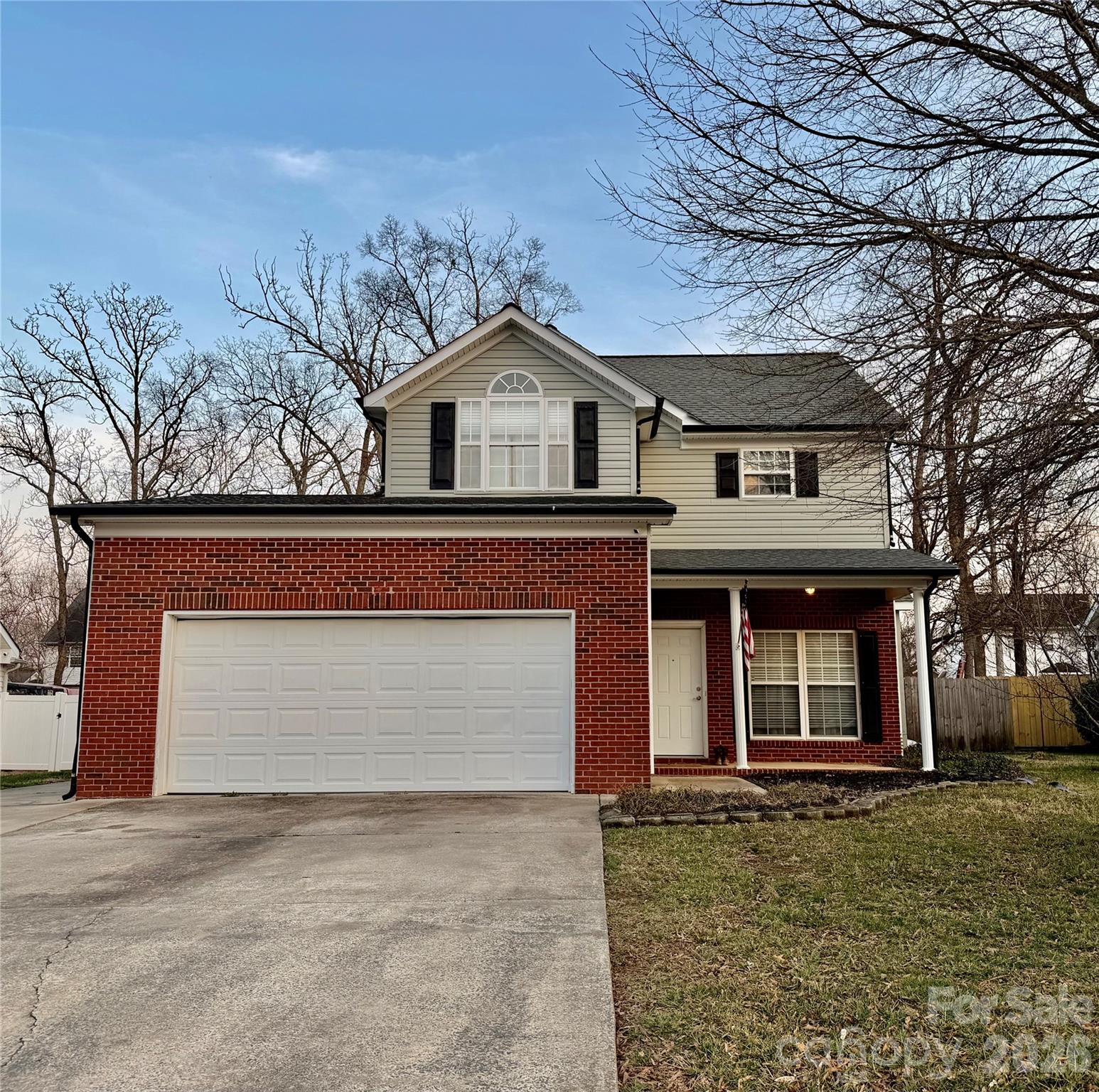 Two-story 3 bed & 2.5 bath home has vinyl side and a brick faced garage. Enter through the front door to the living with a fireplace and TV Niche which leads to the Dining room, Kitchen, & half Bathroom. Farmhouse look with wood accent touches throughout the home. Upstairs you will find three total bedrooms including the primary Bedroom, bathroom, & walk in closet. Two secondary bedrooms, a full Bathroom and a laundry closet. The backyard features a heated in-ground pool, a hot tub, and a Shed.  It has a two car garage which can be converted into a living area or play area. Conveniently located near food shopping, medical facilities, and Independence Blvd which leads to uptown Charlotte or Monroe. Showings start Friday 3/13!
